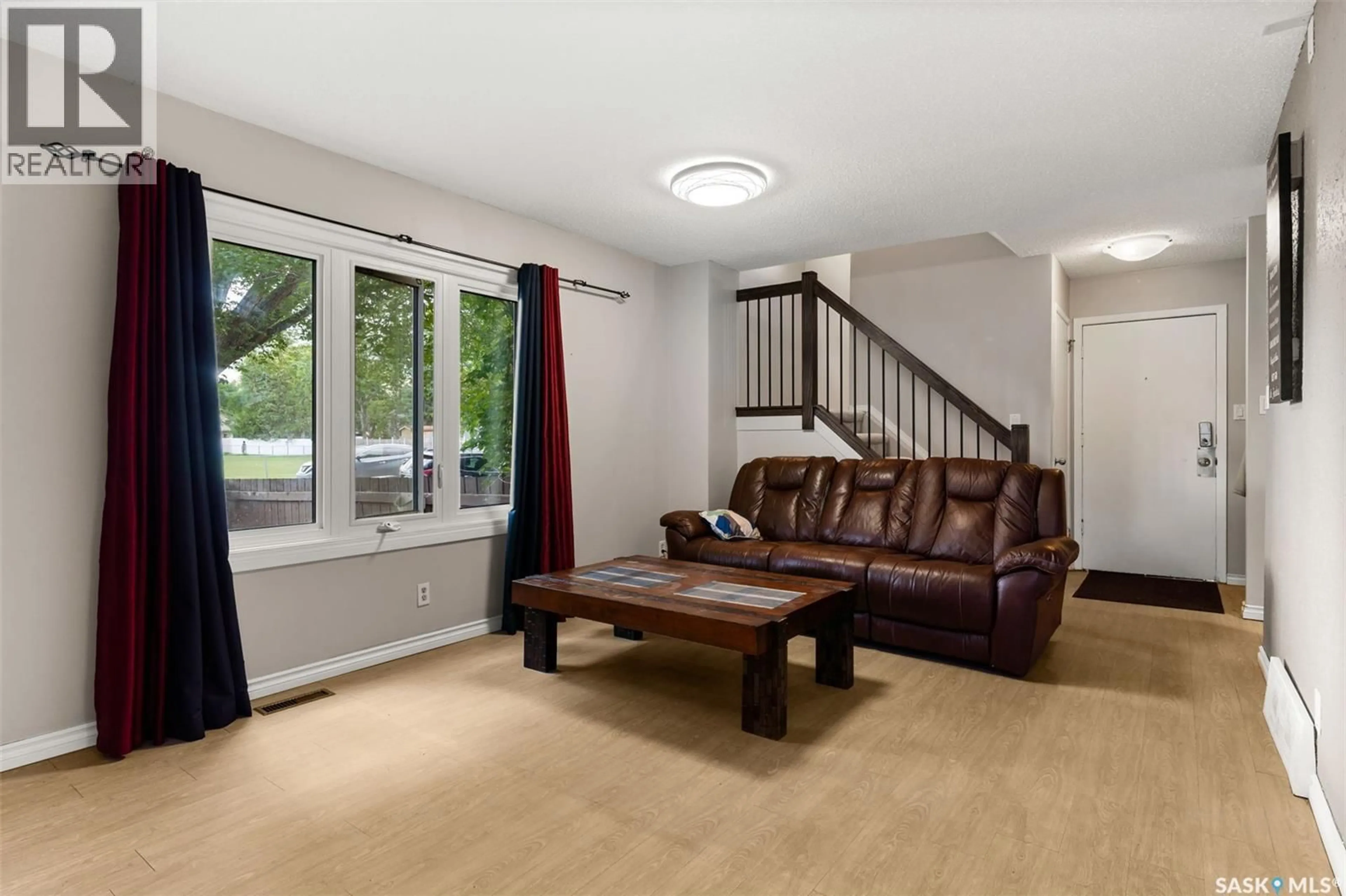 Living room with furniture, unknown for B - 4204 CASTLE ROAD, Regina Saskatchewan S4S4W1