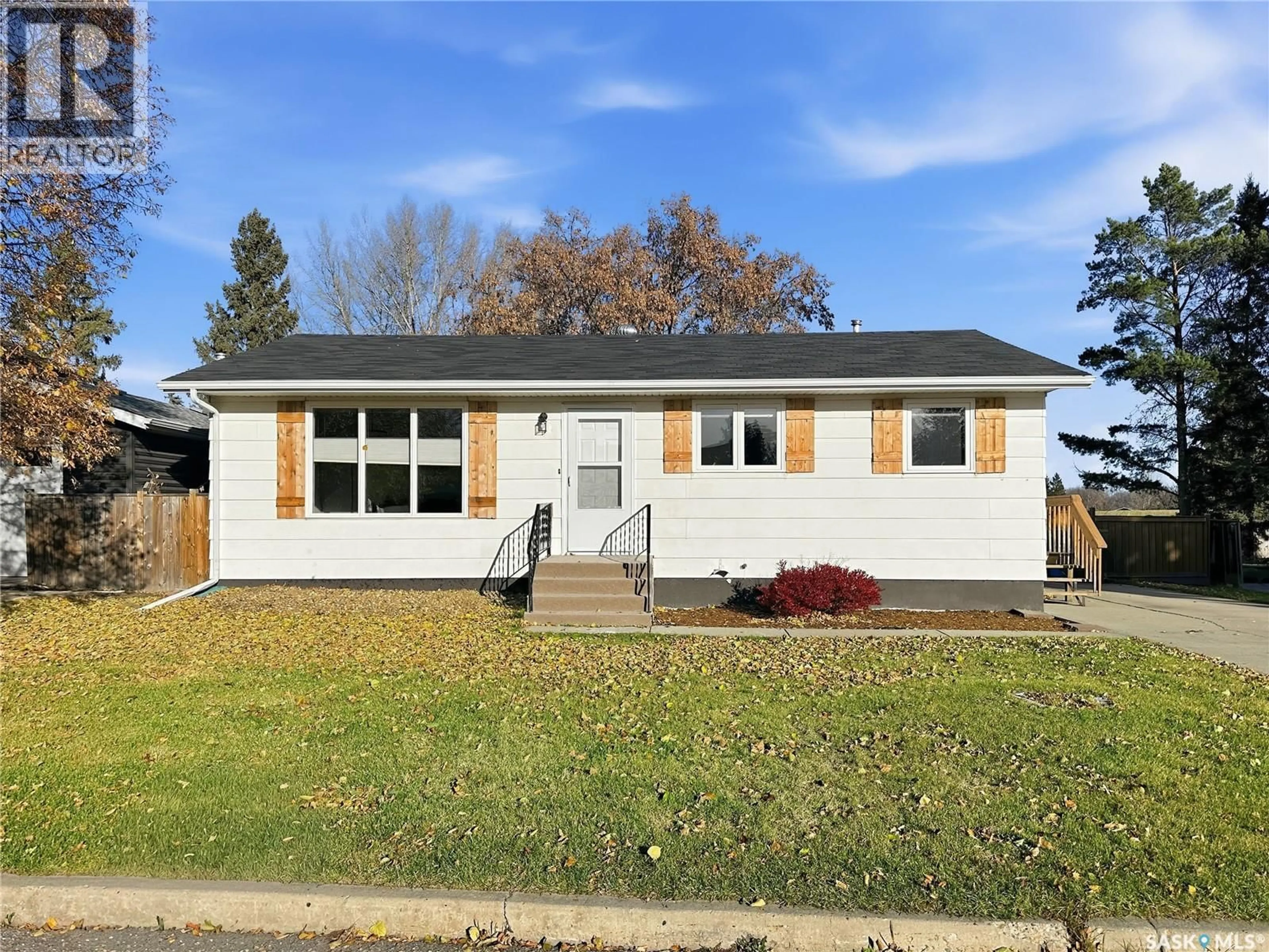 Home with vinyl exterior material, street for 9128 WALKER DRIVE, North Battleford Saskatchewan S9A2X1