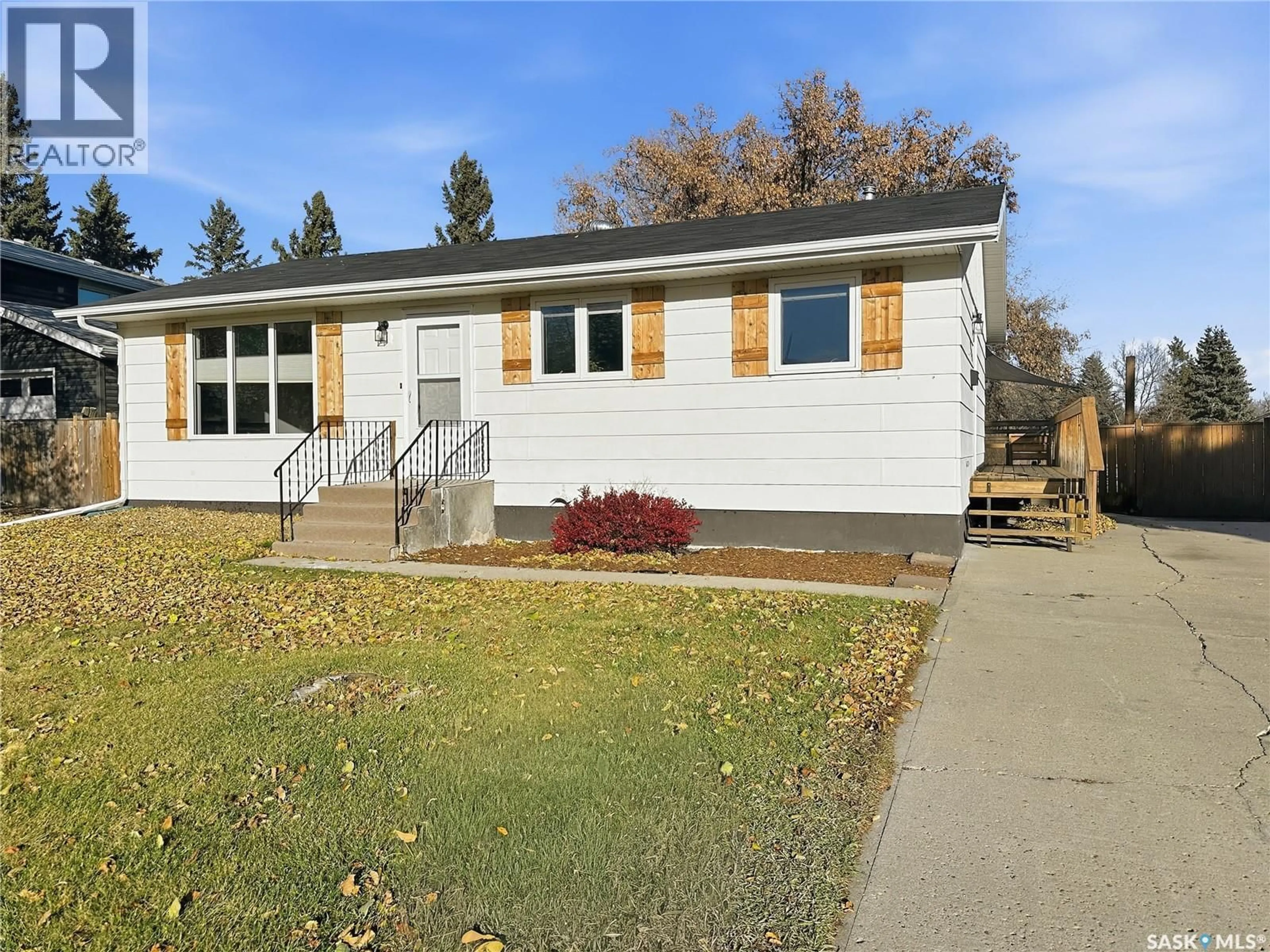 Home with vinyl exterior material, street for 9128 WALKER DRIVE, North Battleford Saskatchewan S9A2X1