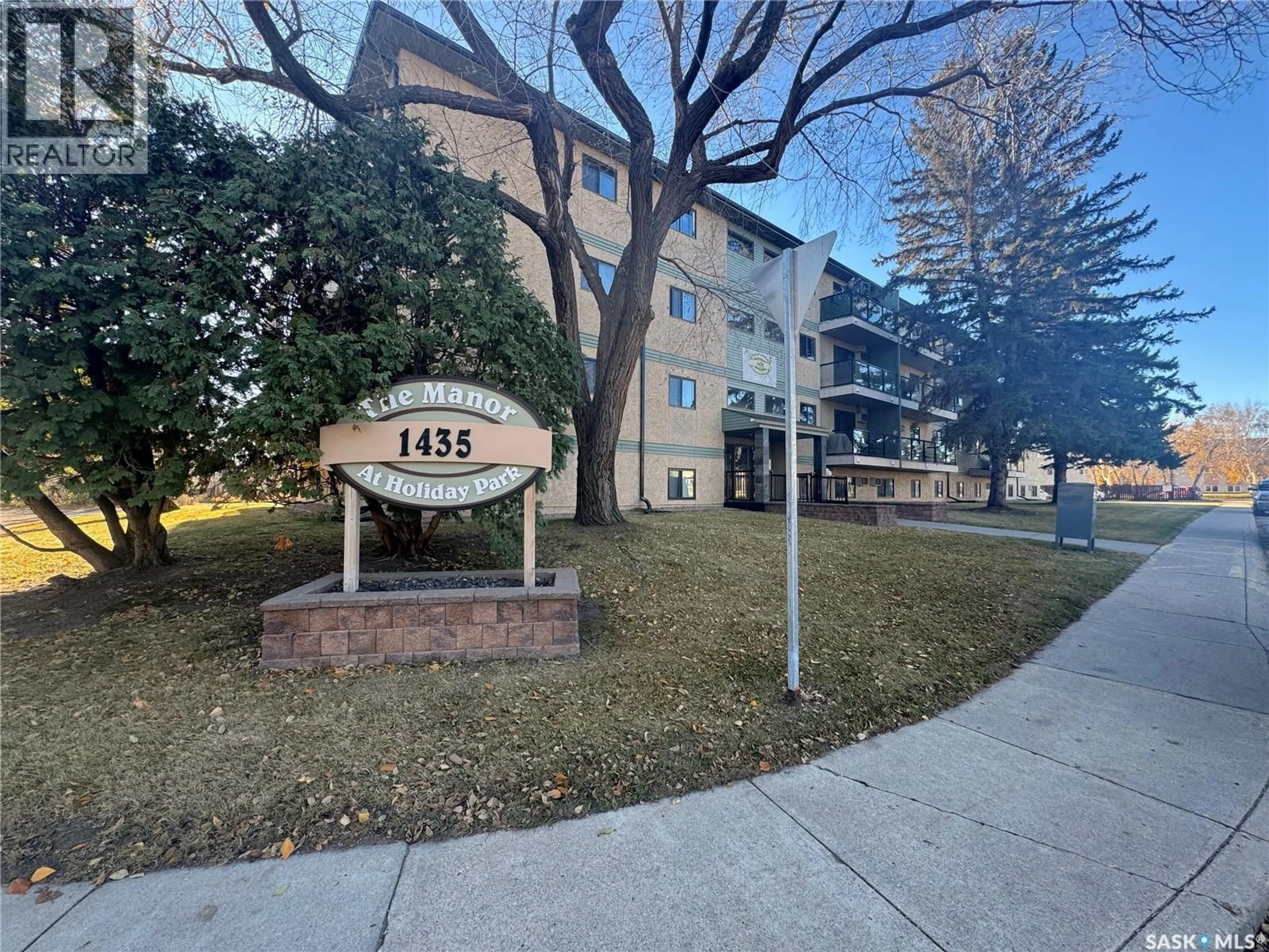 A pic from outside/outdoor area/front of a property/back of a property/a pic from drone, street for 305 - 1435 EMBASSY DRIVE, Saskatoon Saskatchewan S7M4E5