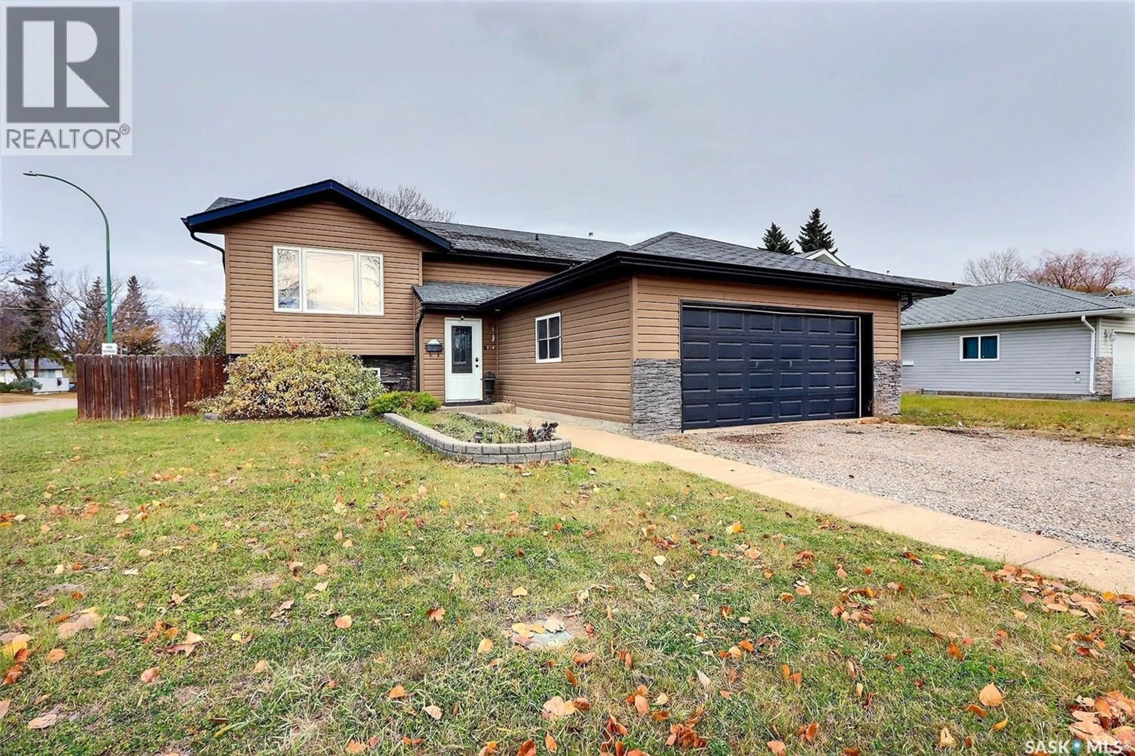 Home with brick exterior material, street for 1402 7TH STREET, Prince Albert Saskatchewan S6V0V4