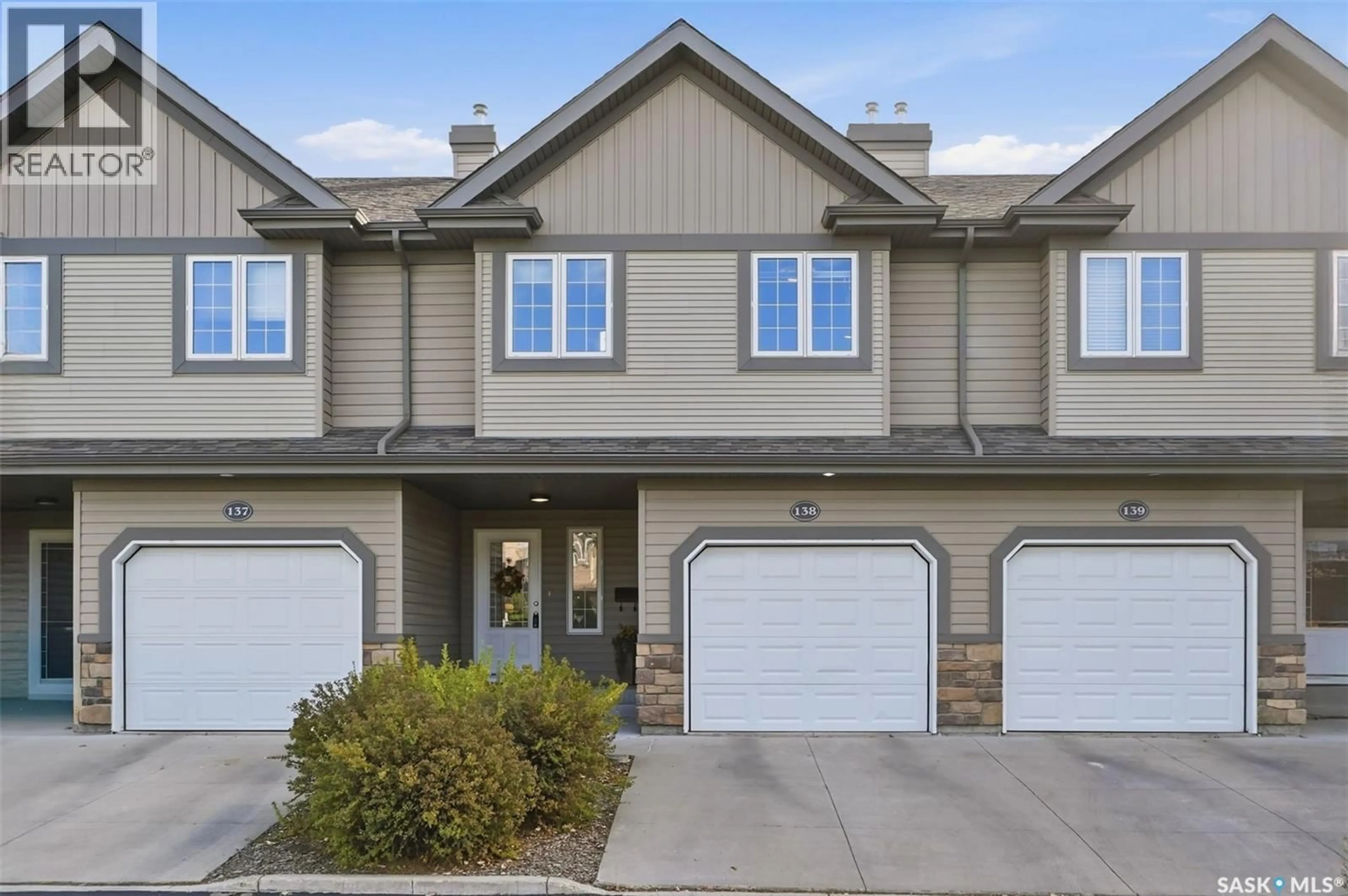 Home with vinyl exterior material, street for 615 - 138 STENSRUD ROAD, Saskatoon Saskatchewan S7W0A2