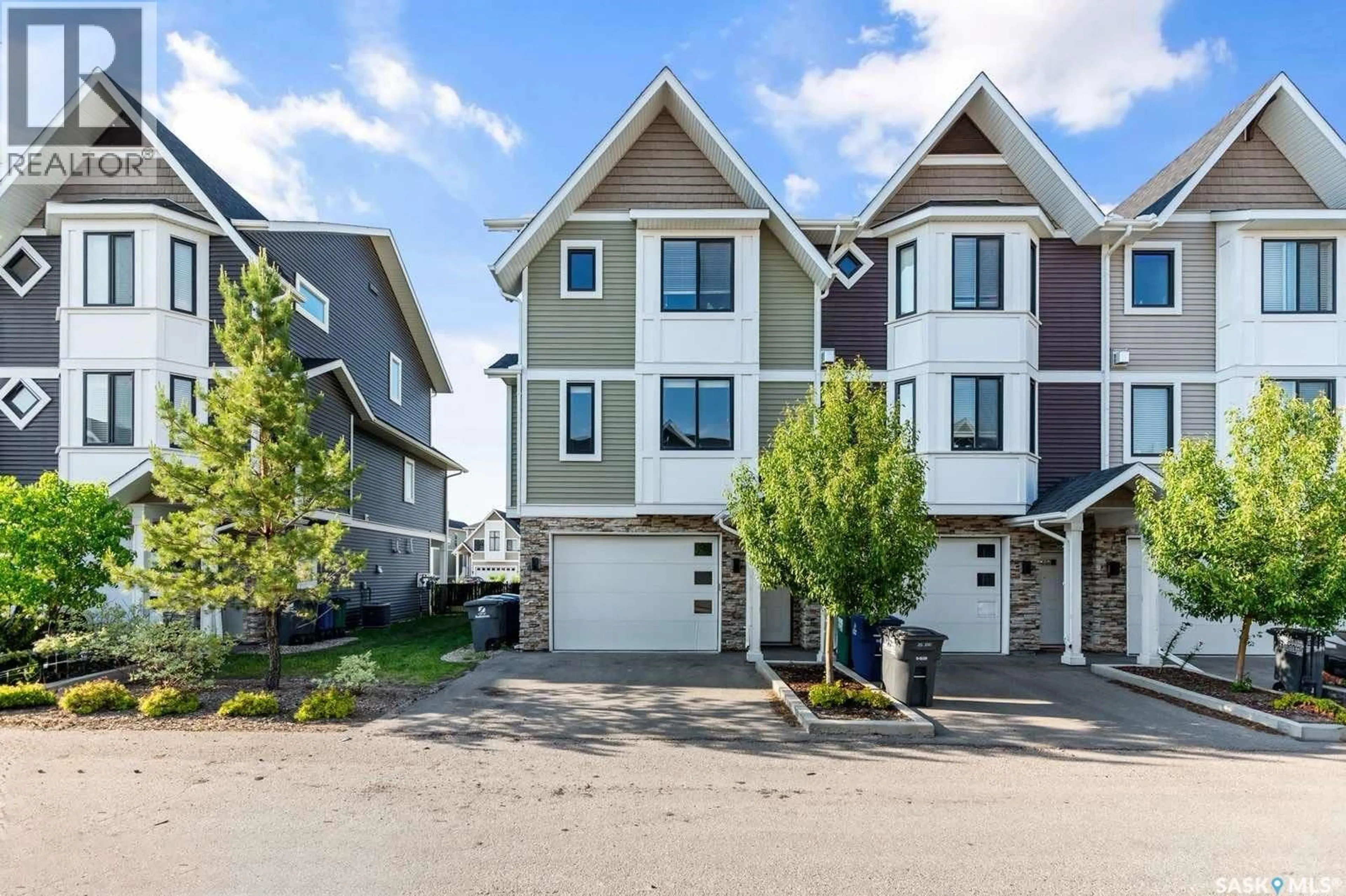 A pic from outside/outdoor area/front of a property/back of a property/a pic from drone, street for 224 - 3220 11TH STREET, Saskatoon Saskatchewan S7M5M4