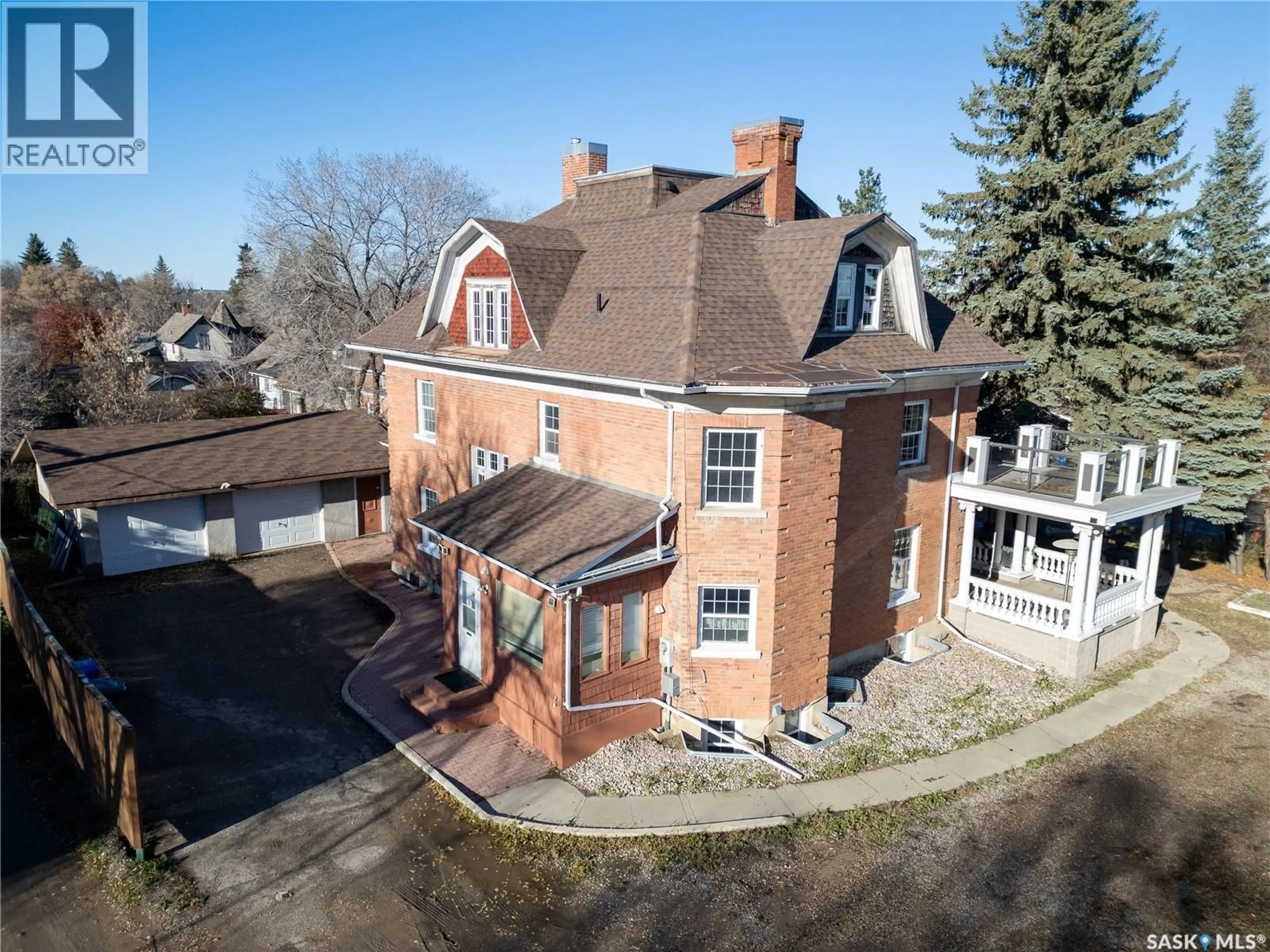 A pic from outside/outdoor area/front of a property/back of a property/a pic from drone, building for 585 19TH STREET, Prince Albert Saskatchewan S6V1K3