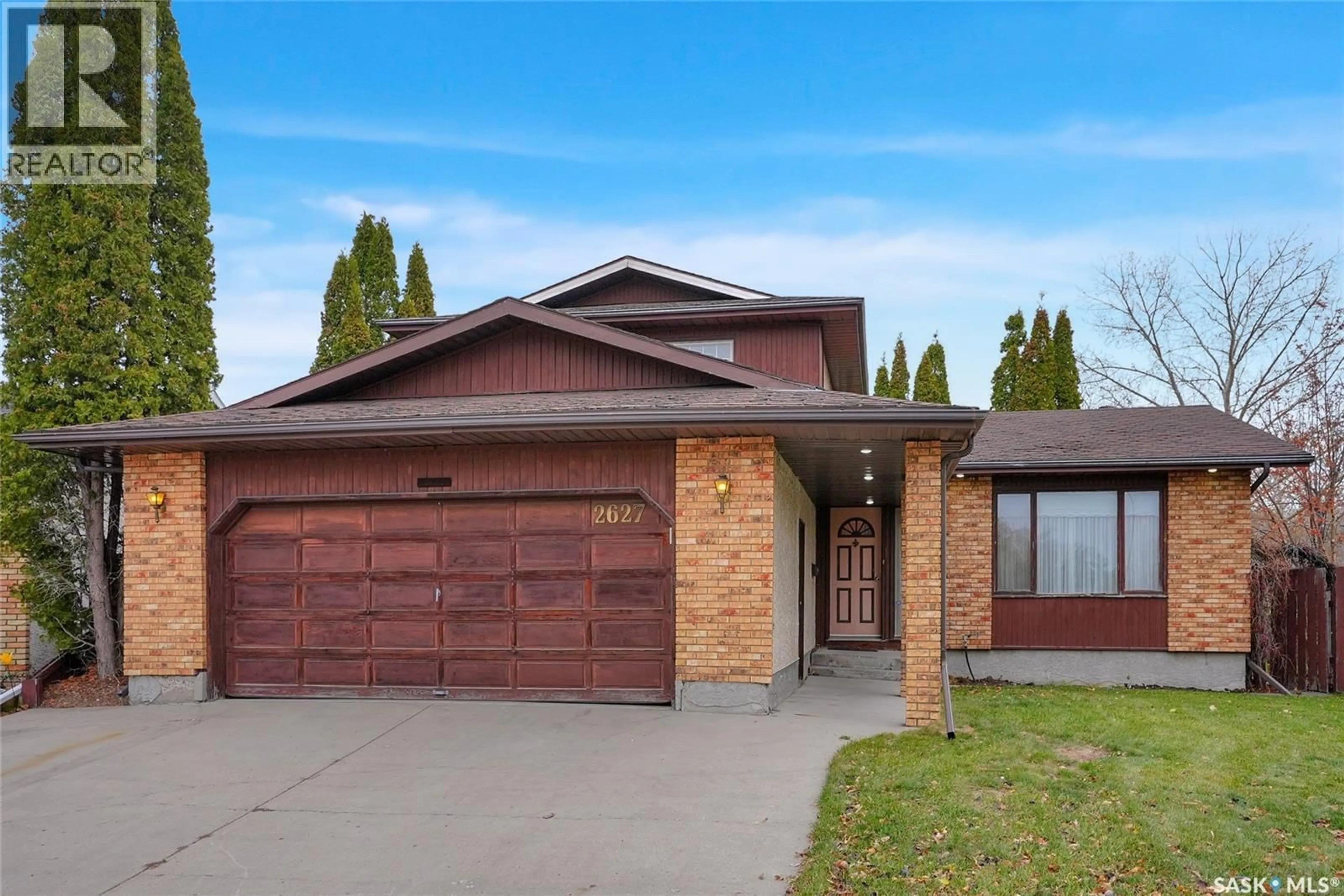 Home with brick exterior material, street for 2627 HOWELL DRIVE, Regina Saskatchewan S4N6G1