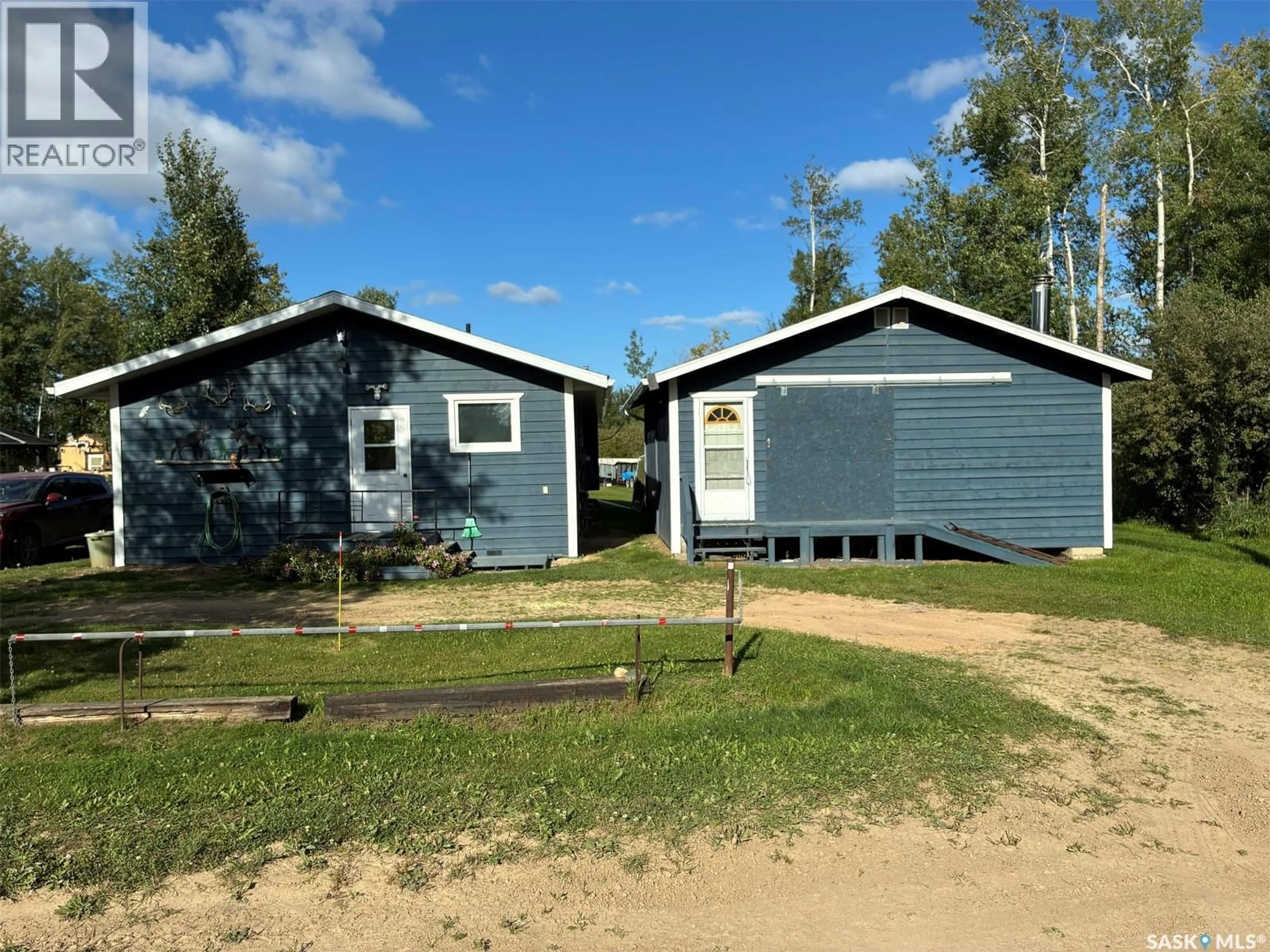 A pic from outside/outdoor area/front of a property/back of a property/a pic from drone, street for Cole Bay Saskatchewan S0M0M0