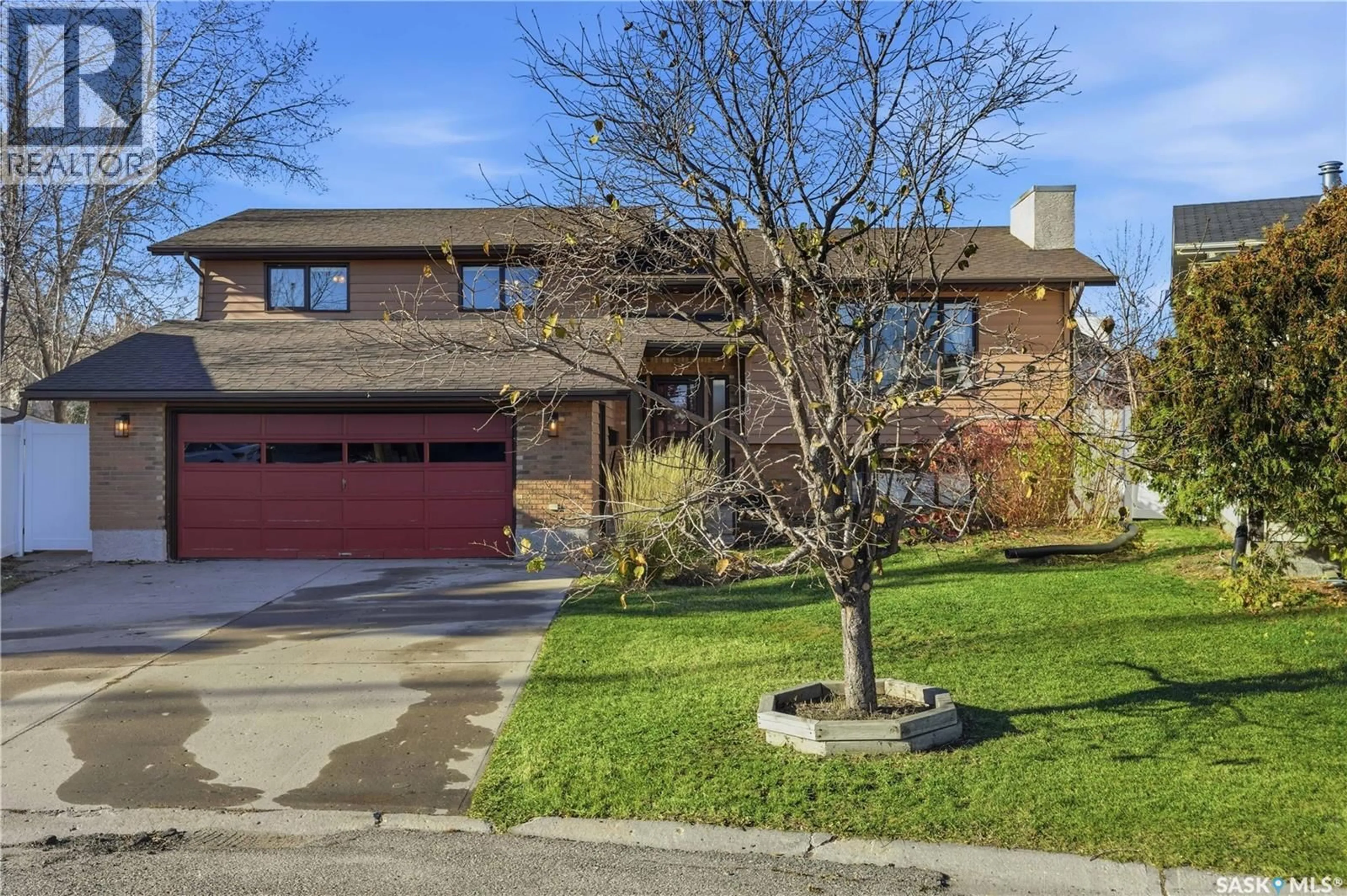 Home with brick exterior material, street for 2610 LAYCOCK BAY, Regina Saskatchewan S4V1V9