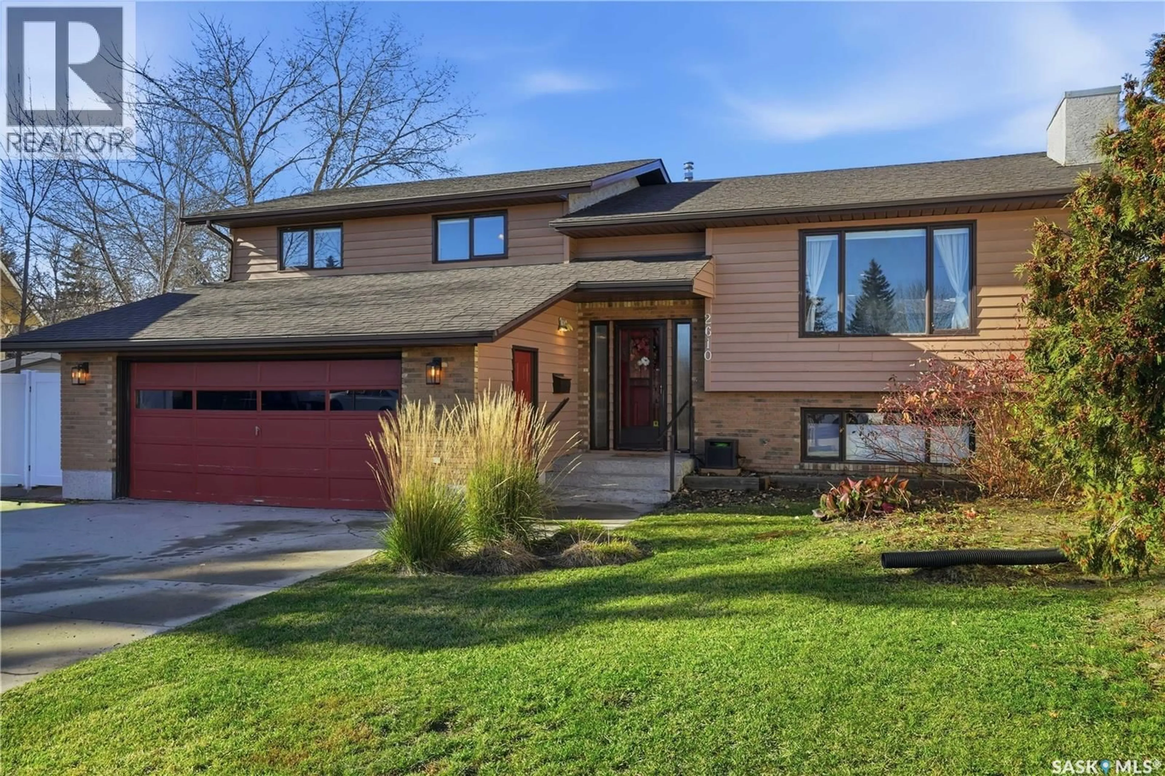 Home with brick exterior material, street for 2610 LAYCOCK BAY, Regina Saskatchewan S4V1V9