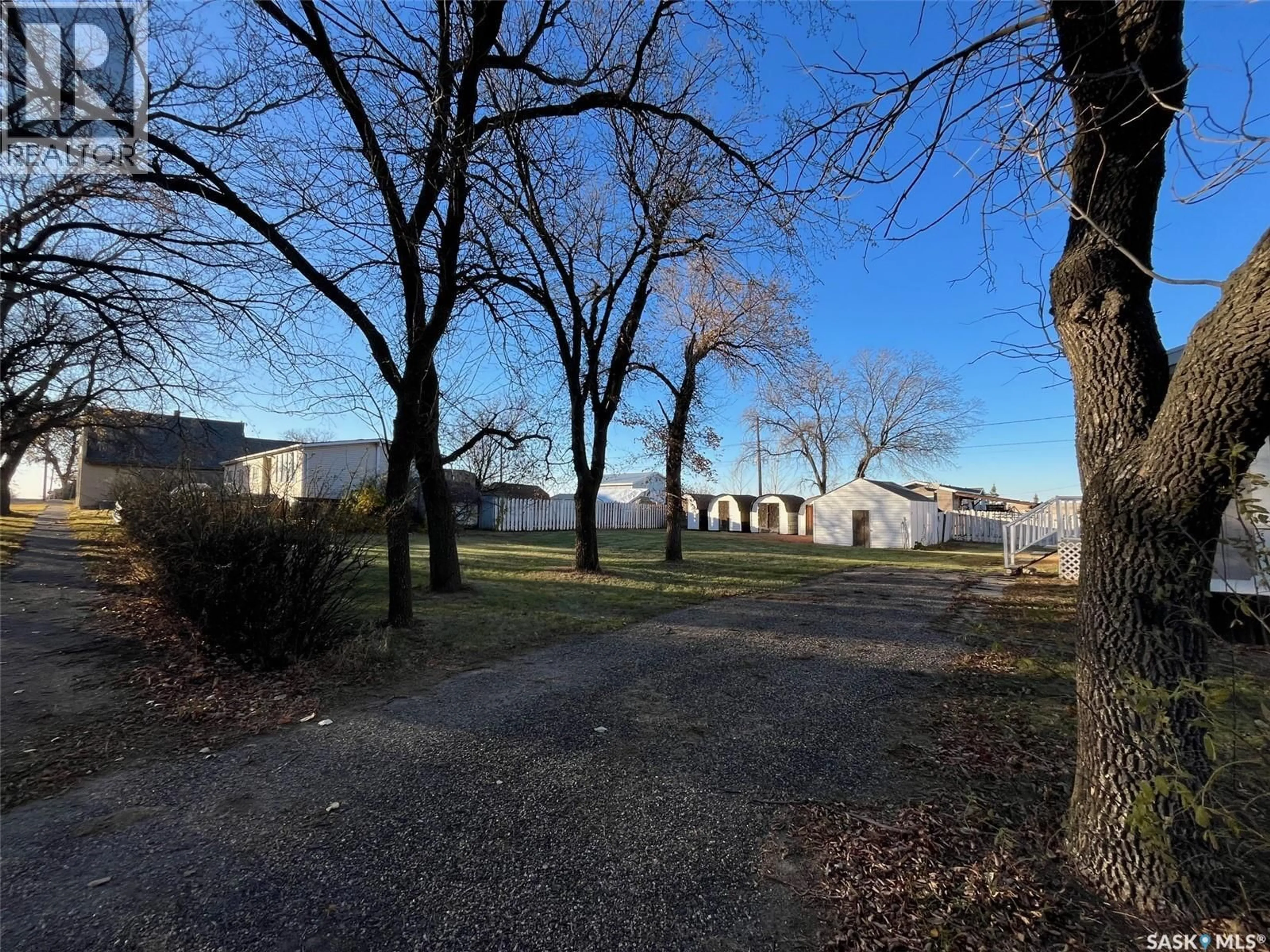 A pic from outside/outdoor area/front of a property/back of a property/a pic from drone, street for E - 118 2 AVENUE, Lafleche Saskatchewan S0H2K0
