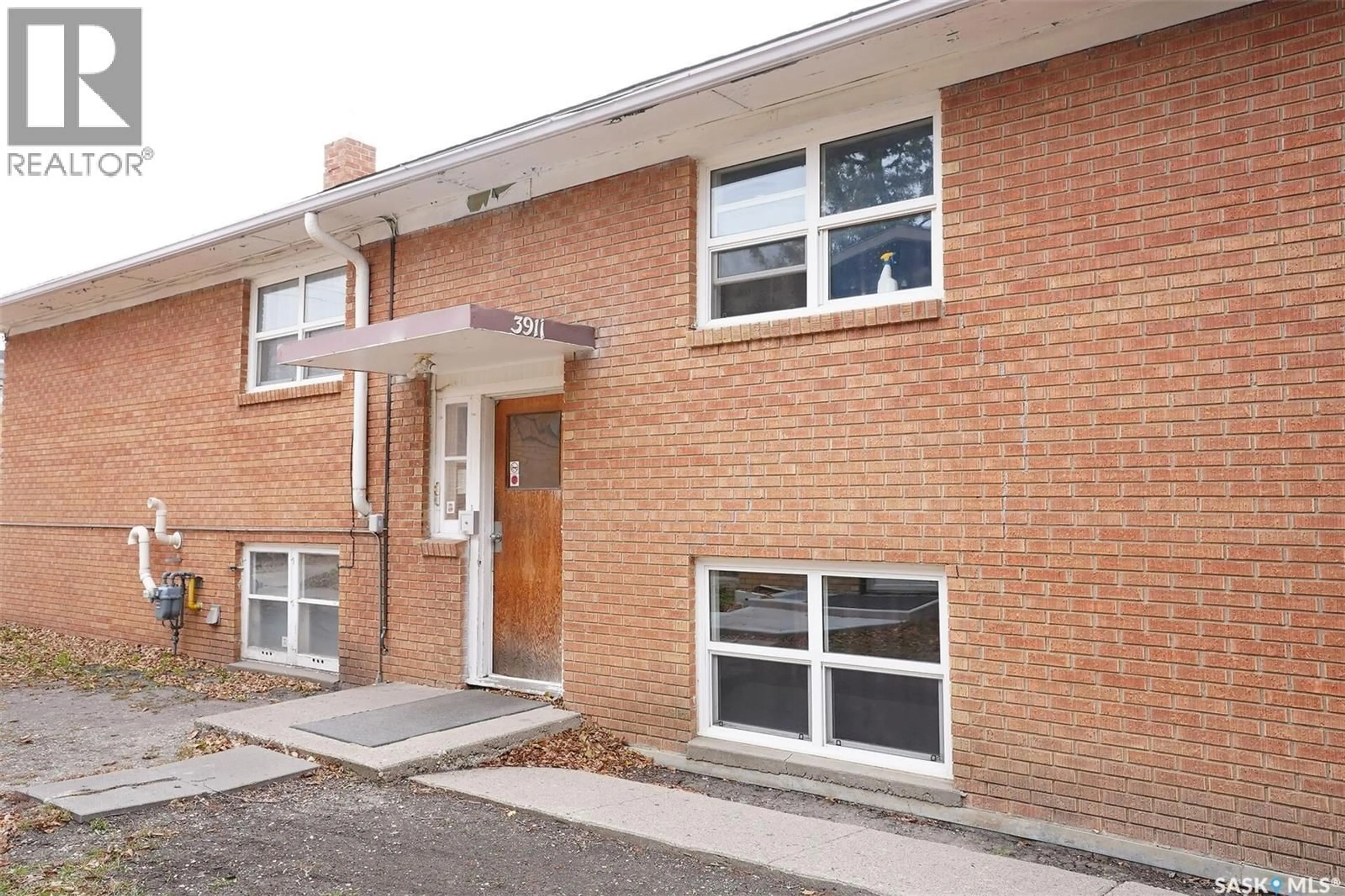 Home with brick exterior material, street for 3911 RETALLACK STREET, Regina Saskatchewan S4S3C1