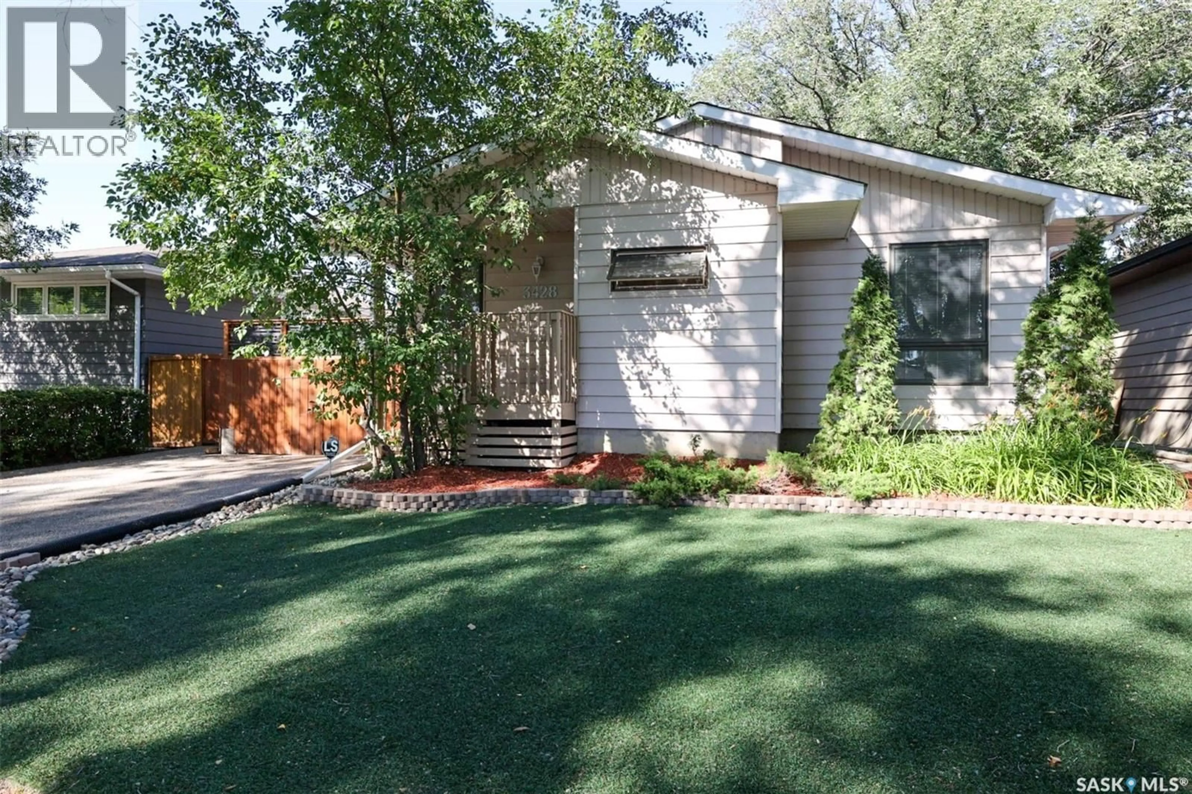 Home with vinyl exterior material, street for 3428 WASCANA STREET, Regina Saskatchewan S4S2H3