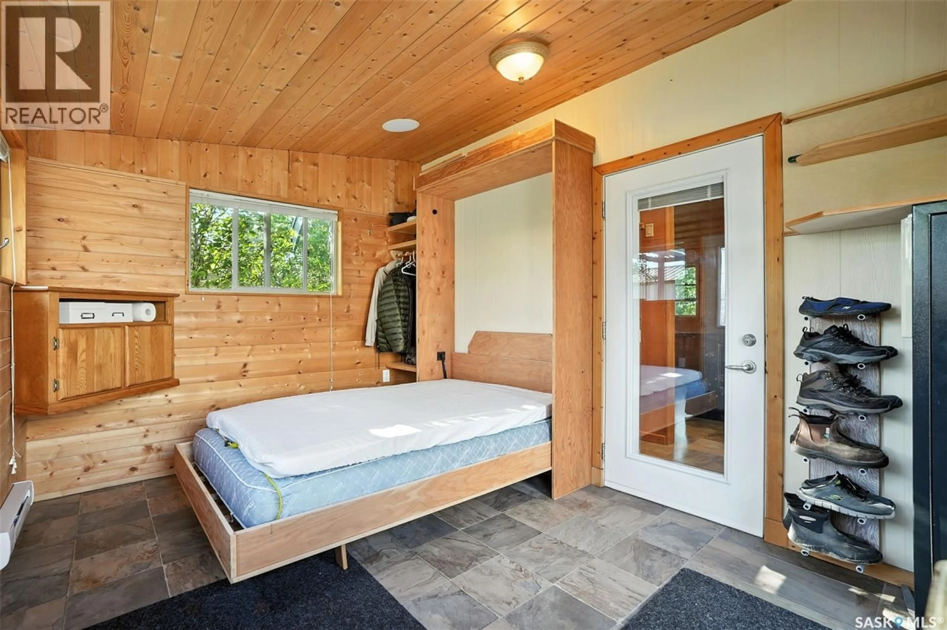 Bedroom with bed, wood/laminate floor for 224 BIRD STREET, Loreburn Saskatchewan S0H2S0