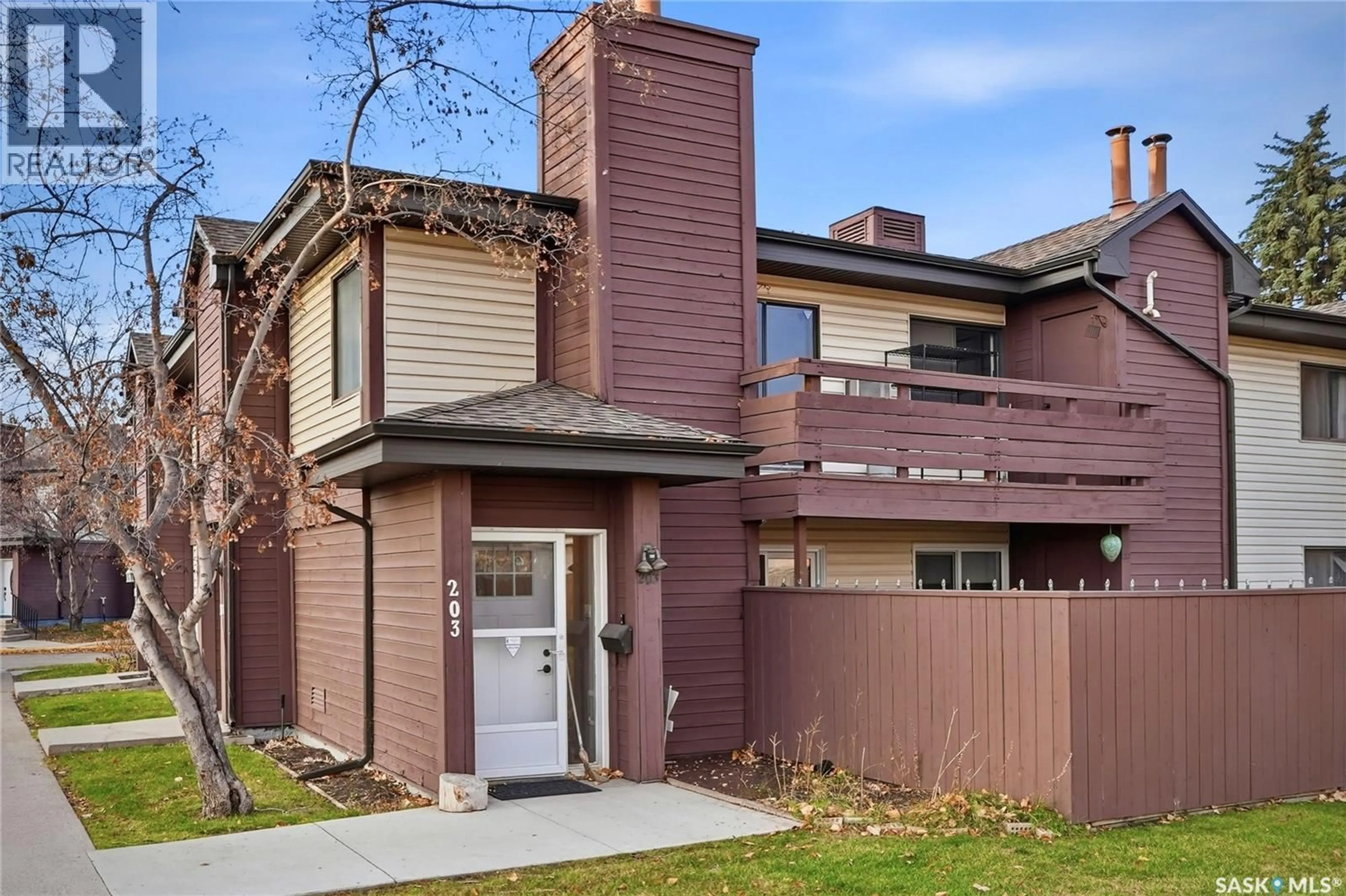 Home with brick exterior material, street for 203 - 447 PENDYGRASSE ROAD, Saskatoon Saskatchewan S7M5C1