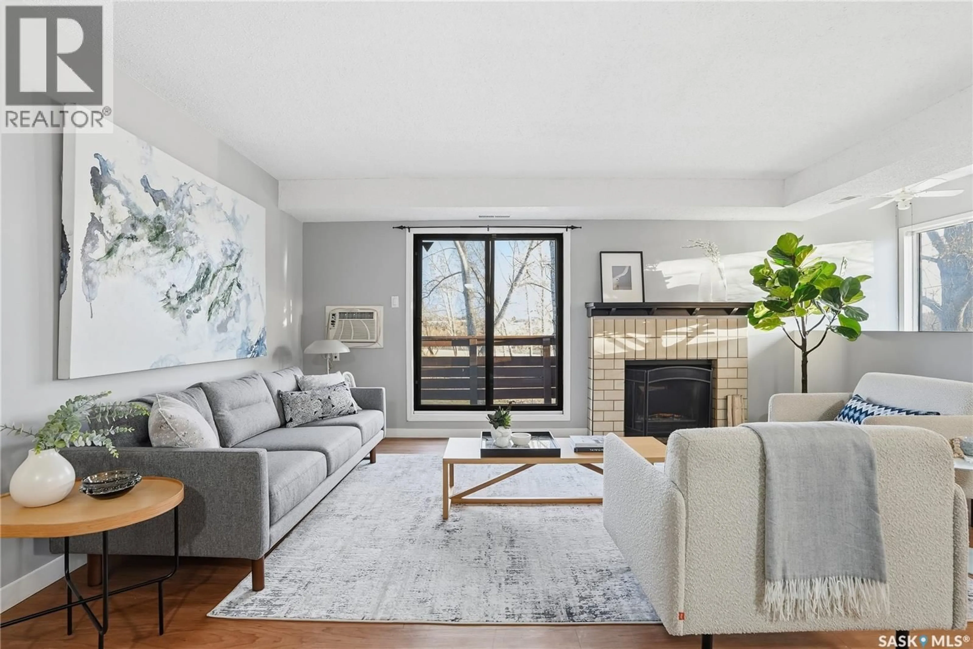 Living room with furniture, unknown for 203 - 447 PENDYGRASSE ROAD, Saskatoon Saskatchewan S7M5C1