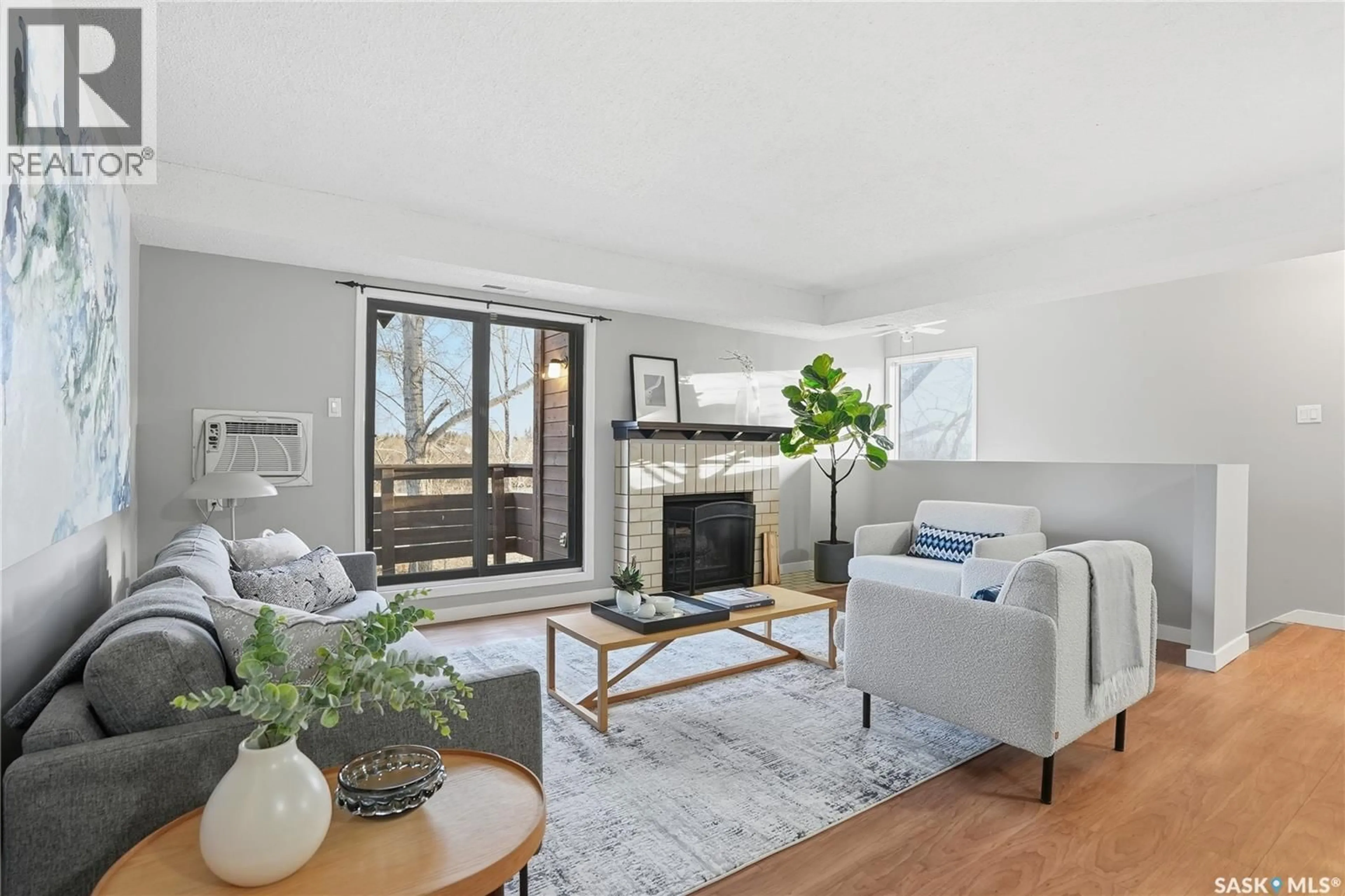 Living room with furniture, unknown for 203 - 447 PENDYGRASSE ROAD, Saskatoon Saskatchewan S7M5C1