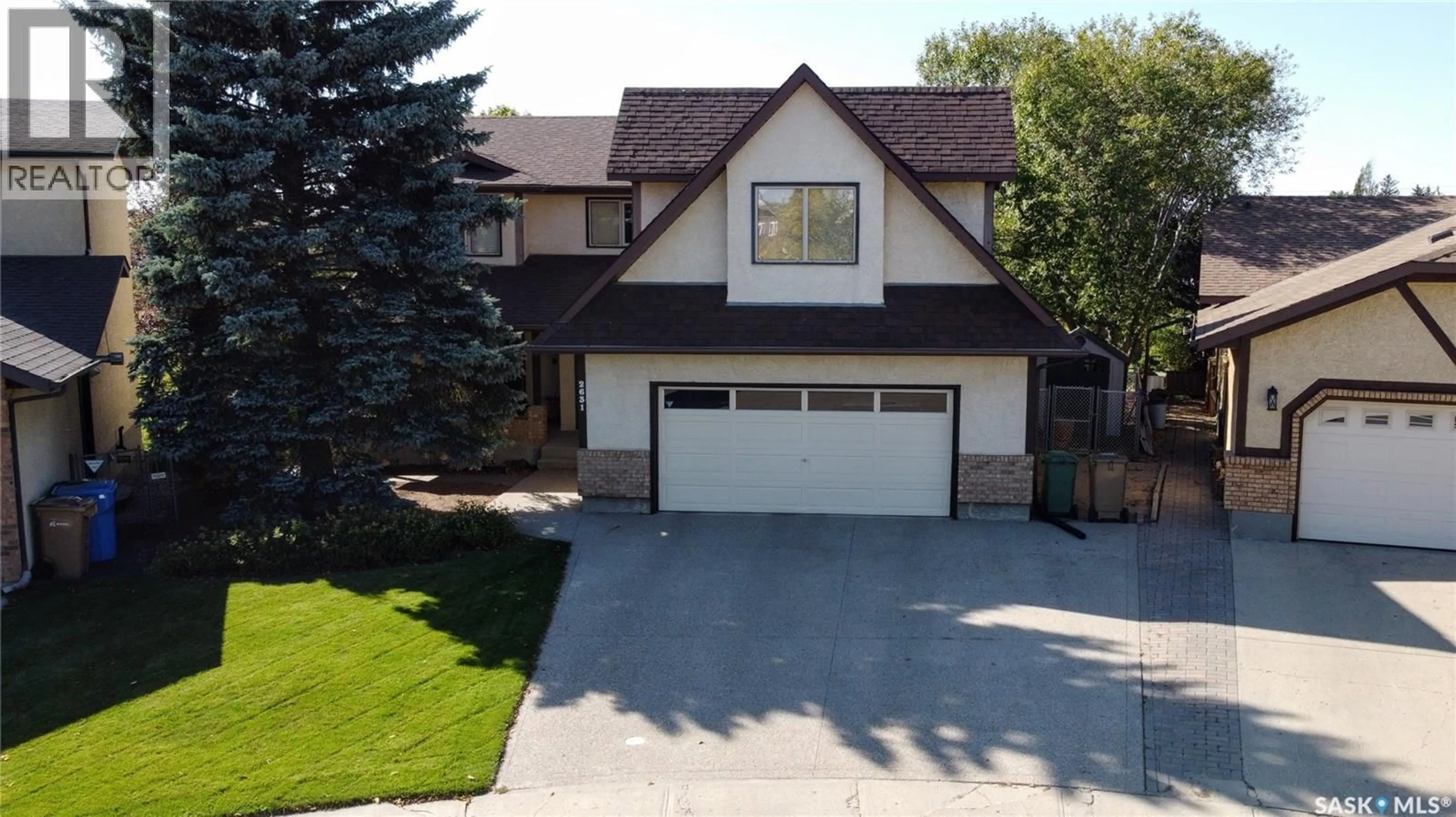 Home with vinyl exterior material, street for 2631 CROCUS DRIVE, Regina Saskatchewan S4V1S8