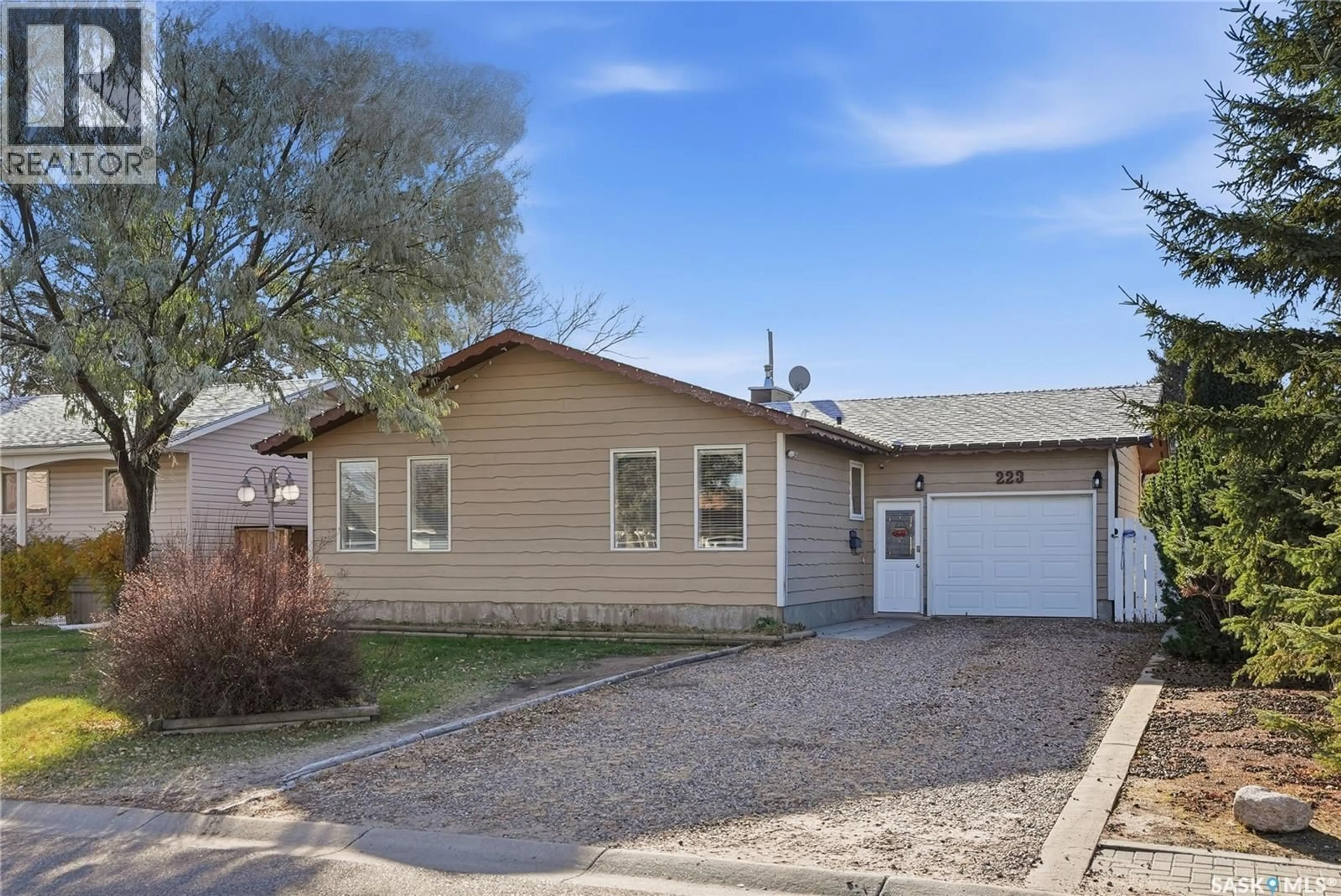 Home with vinyl exterior material, street for 223 MAIN STREET, Warman Saskatchewan S0K4S0
