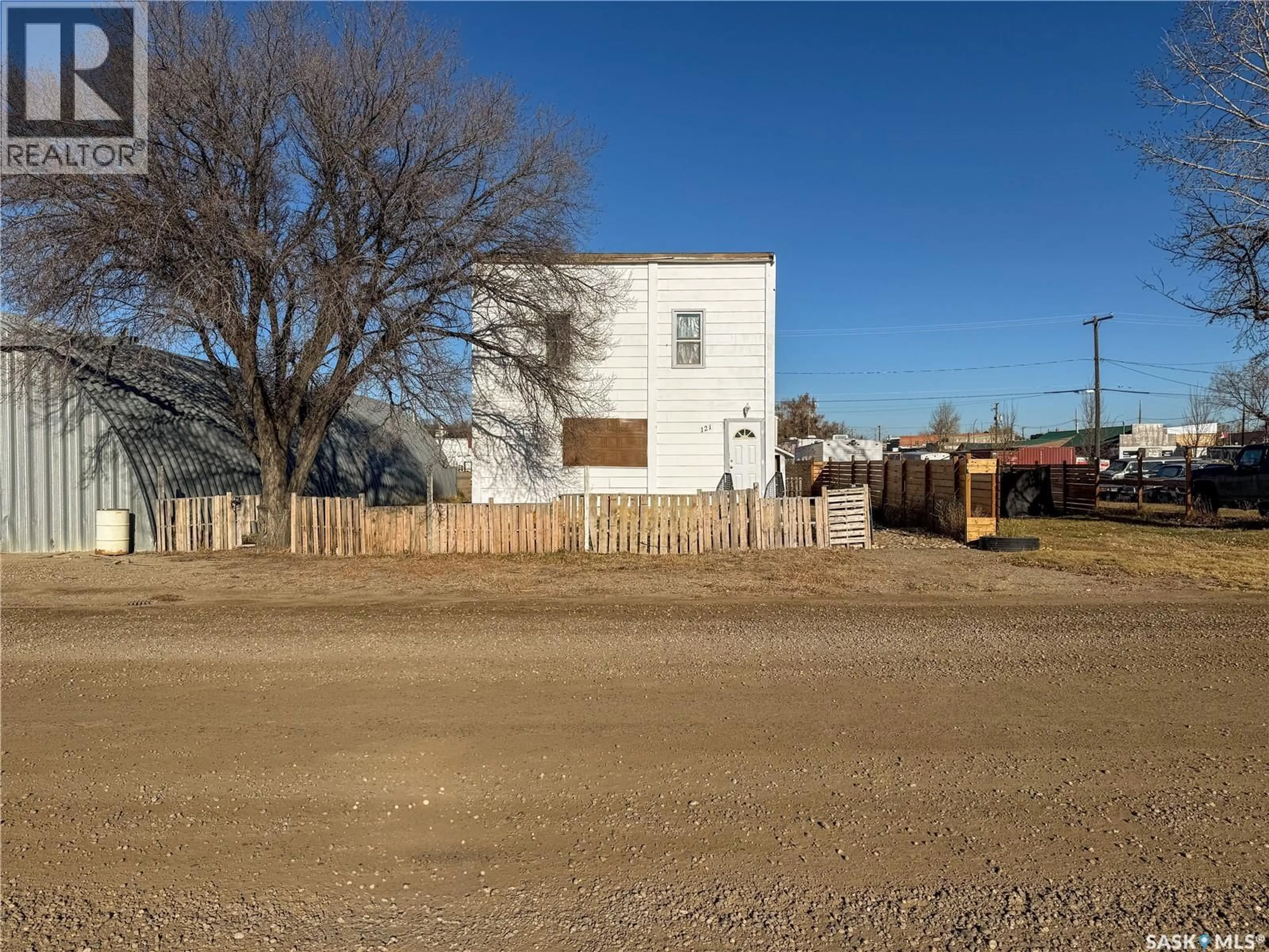 A pic from outside/outdoor area/front of a property/back of a property/a pic from drone, street for 121 1ST AVENUE, Shaunavon Saskatchewan S0N2M0
