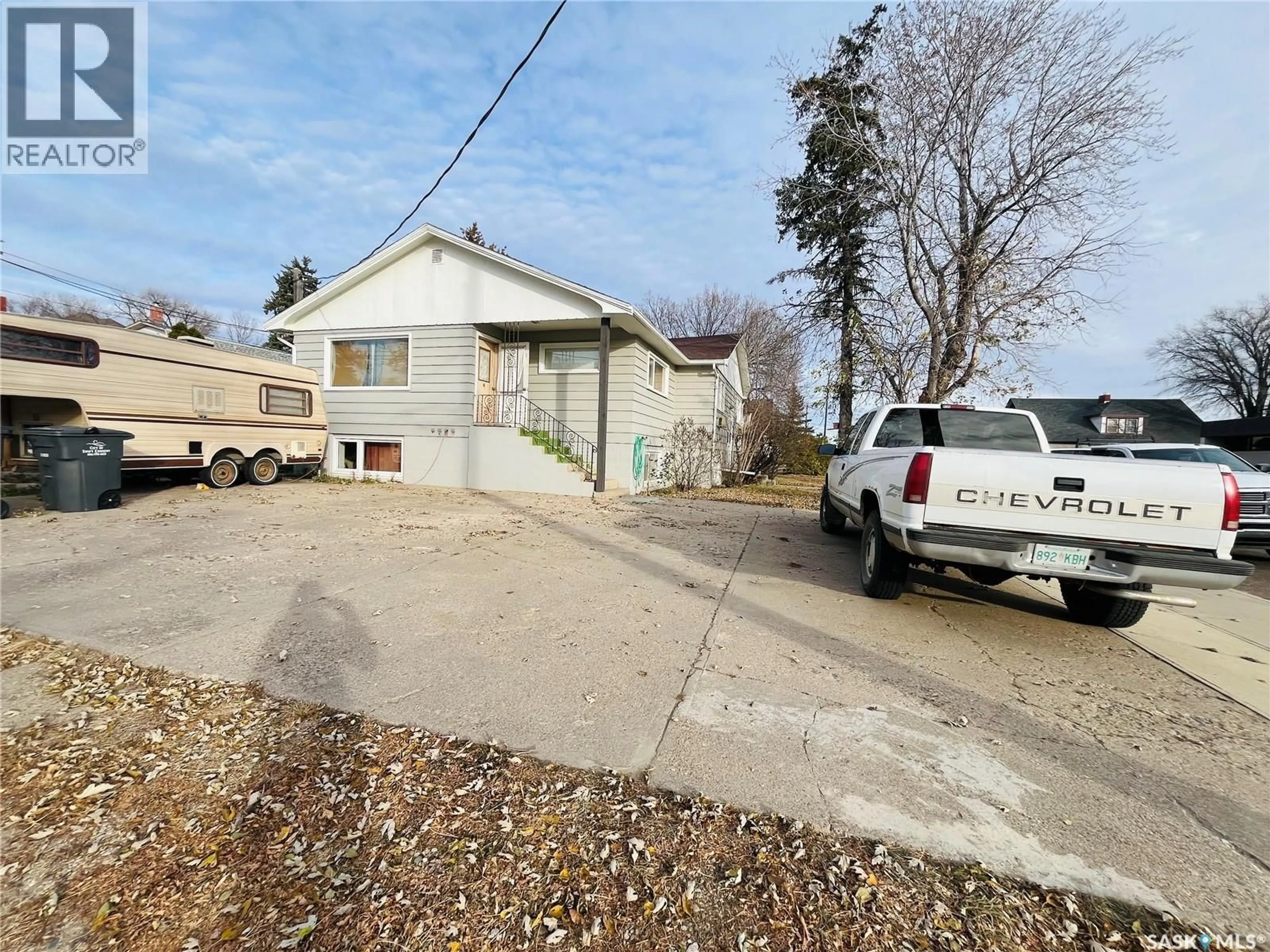 A pic from outside/outdoor area/front of a property/back of a property/a pic from drone, street for 335 CHAPLIN STREET, Swift Current Saskatchewan S9H0G2