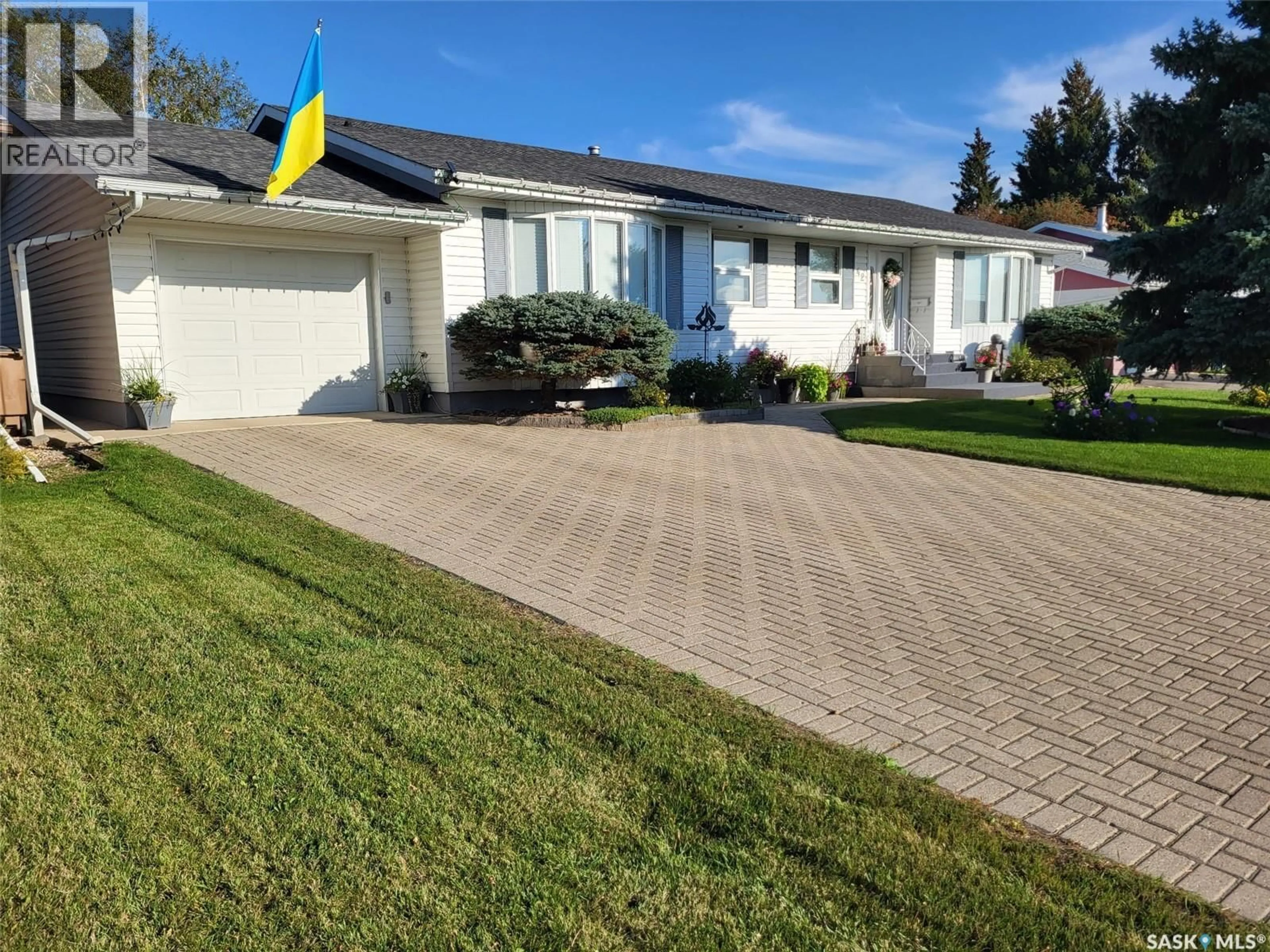 A pic from outside/outdoor area/front of a property/back of a property/a pic from drone, street for 42 7TH STREET, Wadena Saskatchewan S0A4J0