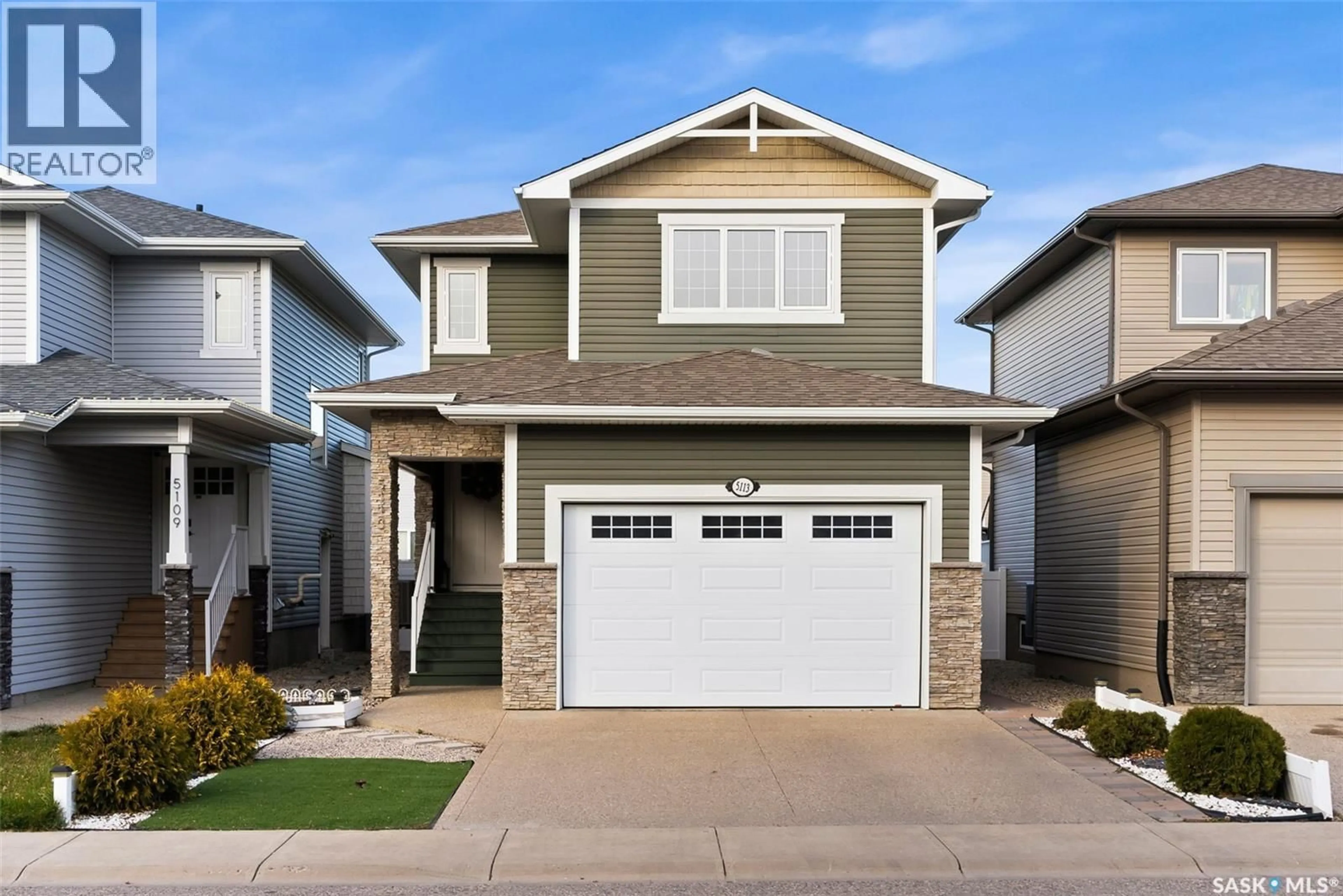 Home with vinyl exterior material, street for 5113 AERIAL CRESCENT, Regina Saskatchewan S4W0C8