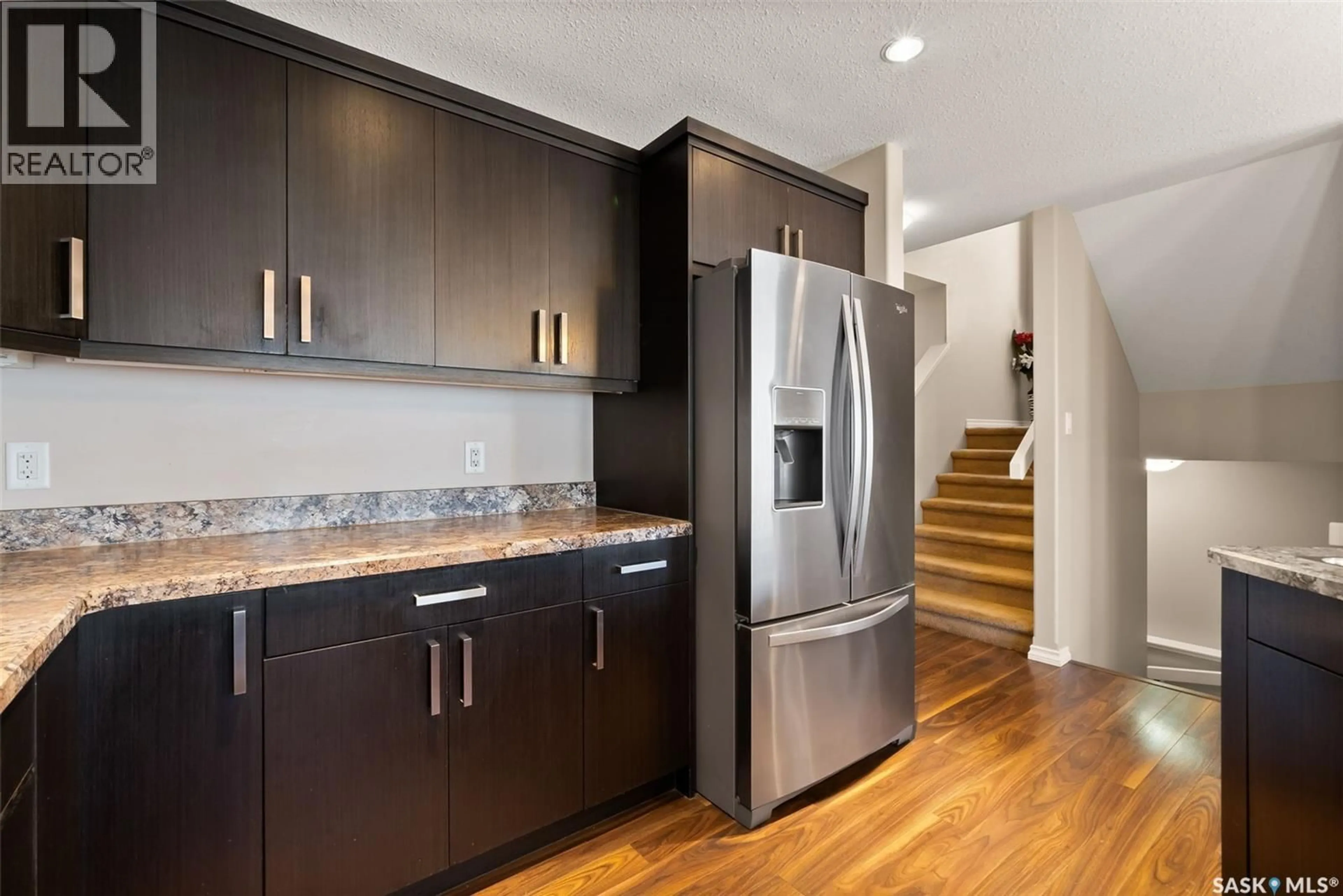 Contemporary kitchen, wood/laminate floor for 5113 AERIAL CRESCENT, Regina Saskatchewan S4W0C8