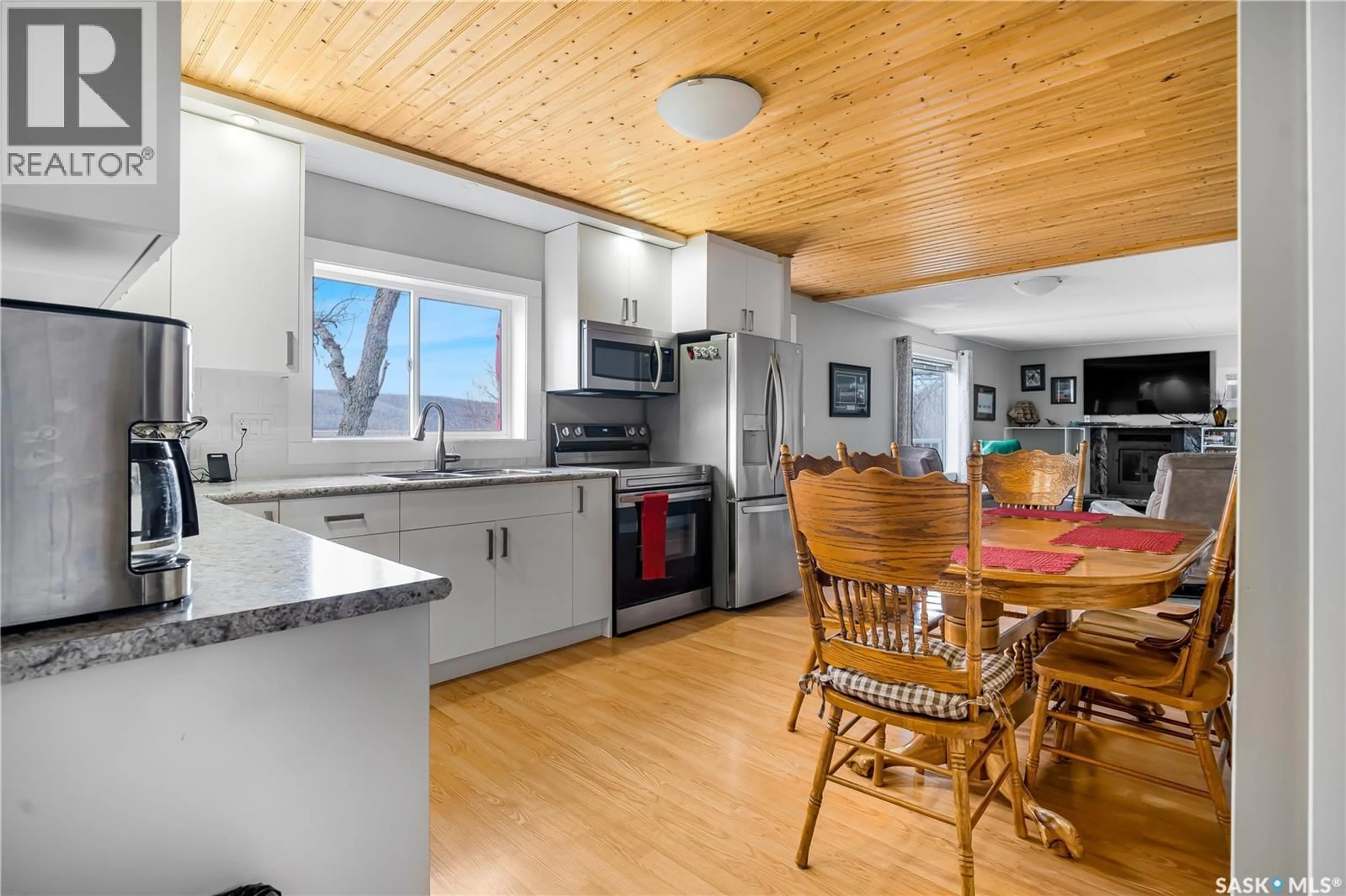 Open concept kitchen, wood/laminate floor for 132 WHITETAIL ROAD, Crooked Lake Saskatchewan S0G2B0