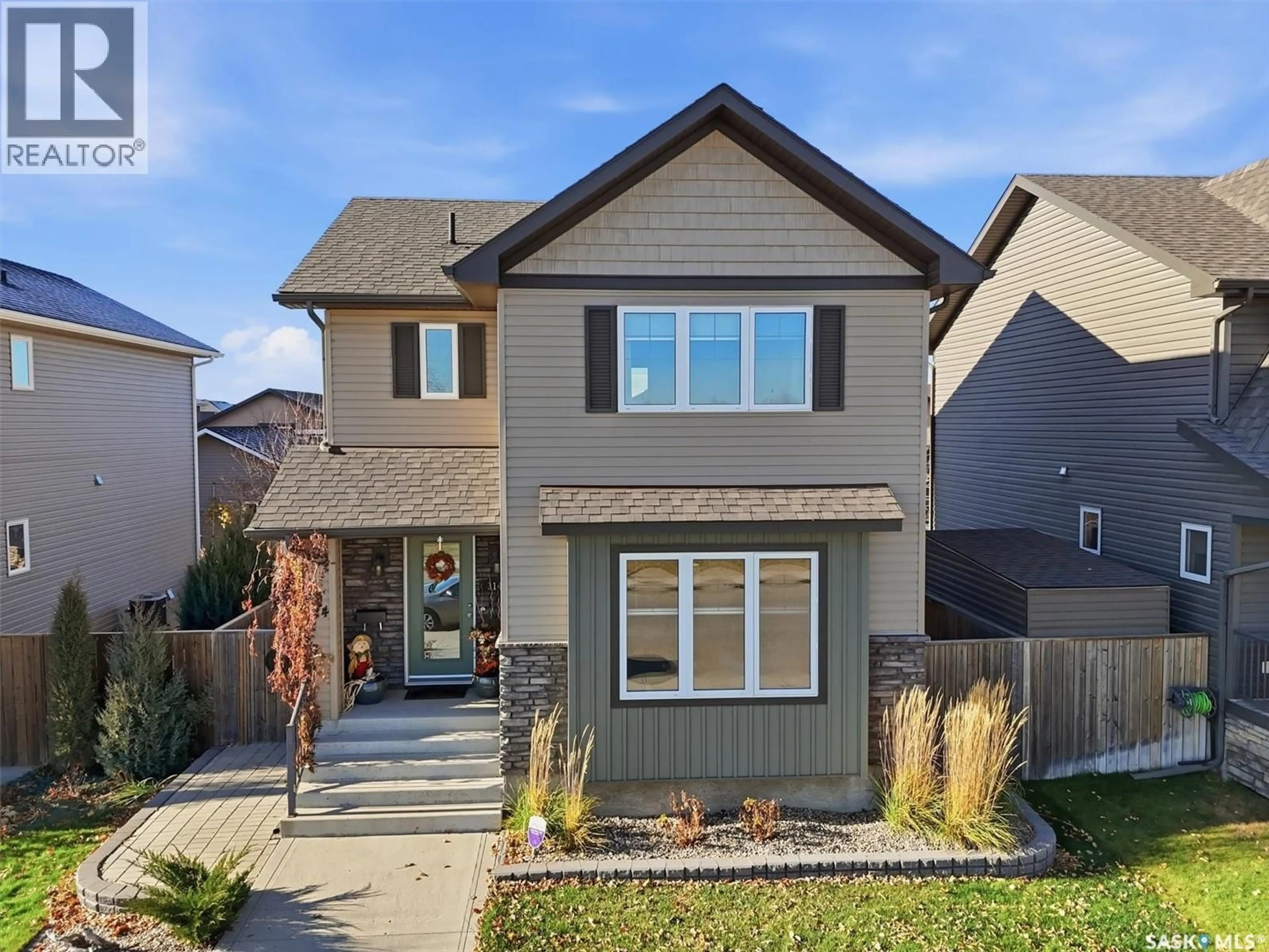 Home with brick exterior material, street for 314 STONEBRIDGE COMMON, Saskatoon Saskatchewan S7T0N6