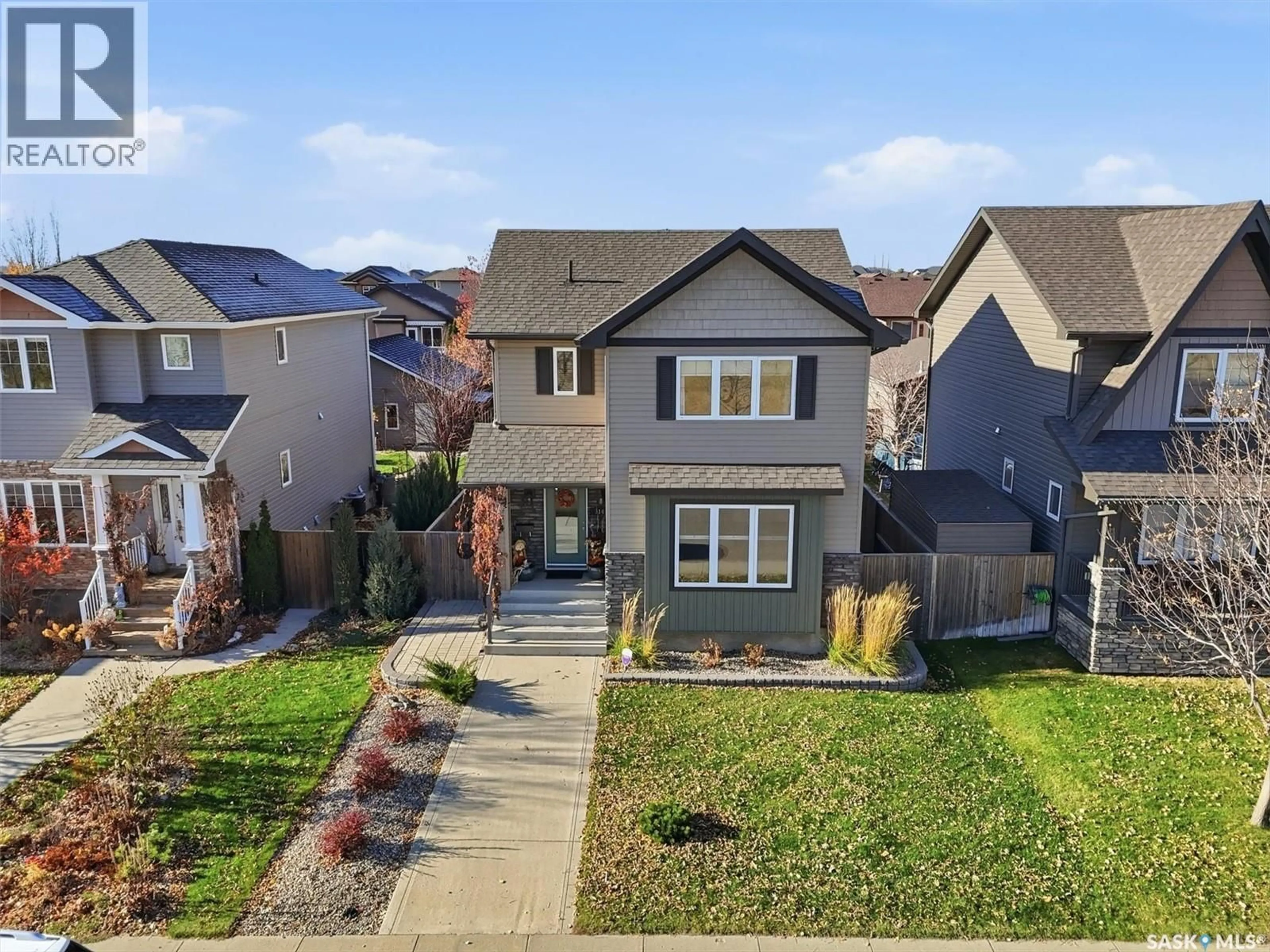 A pic from outside/outdoor area/front of a property/back of a property/a pic from drone, street for 314 STONEBRIDGE COMMON, Saskatoon Saskatchewan S7T0N6