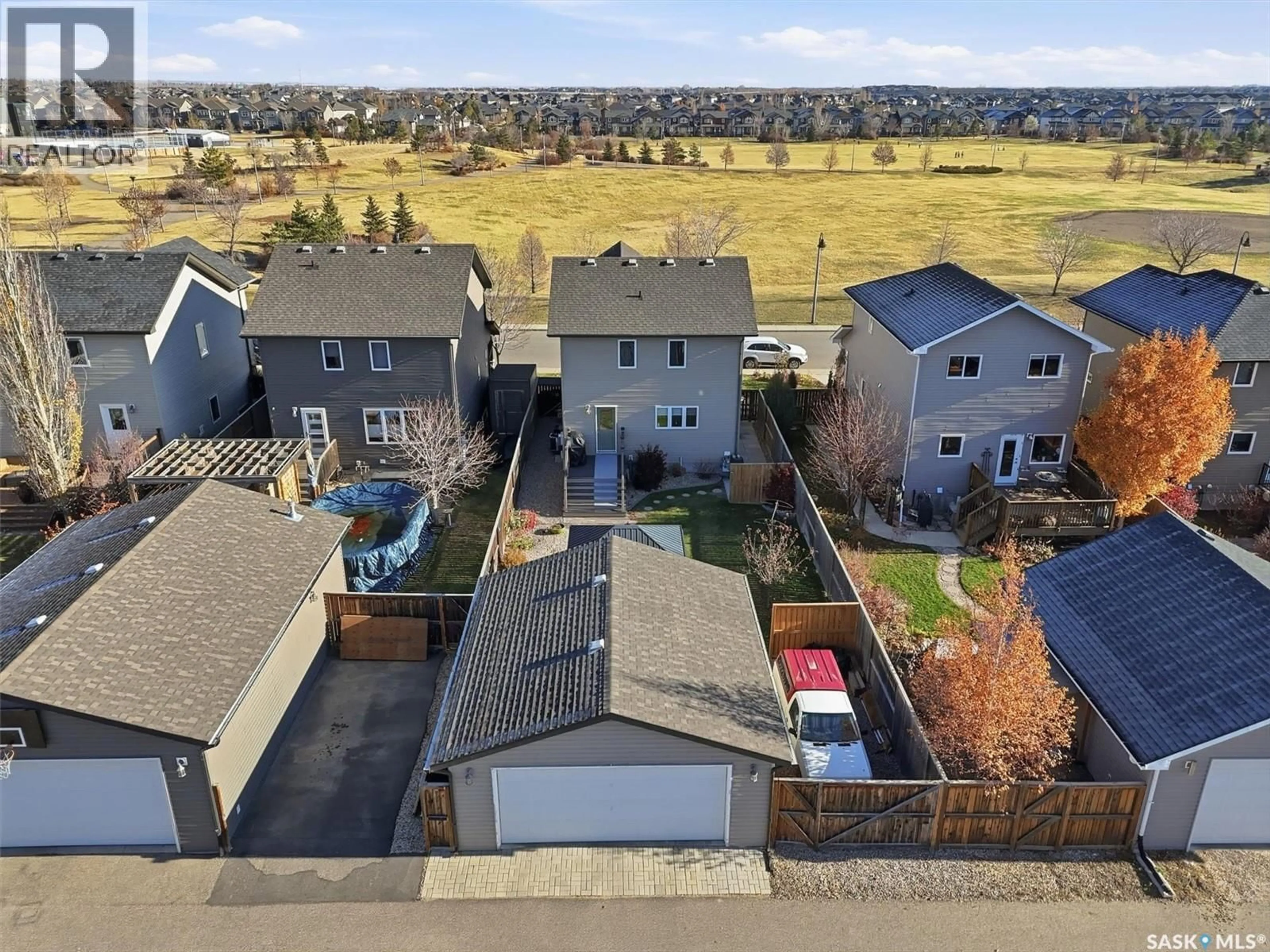 A pic from outside/outdoor area/front of a property/back of a property/a pic from drone, street for 314 STONEBRIDGE COMMON, Saskatoon Saskatchewan S7T0N6