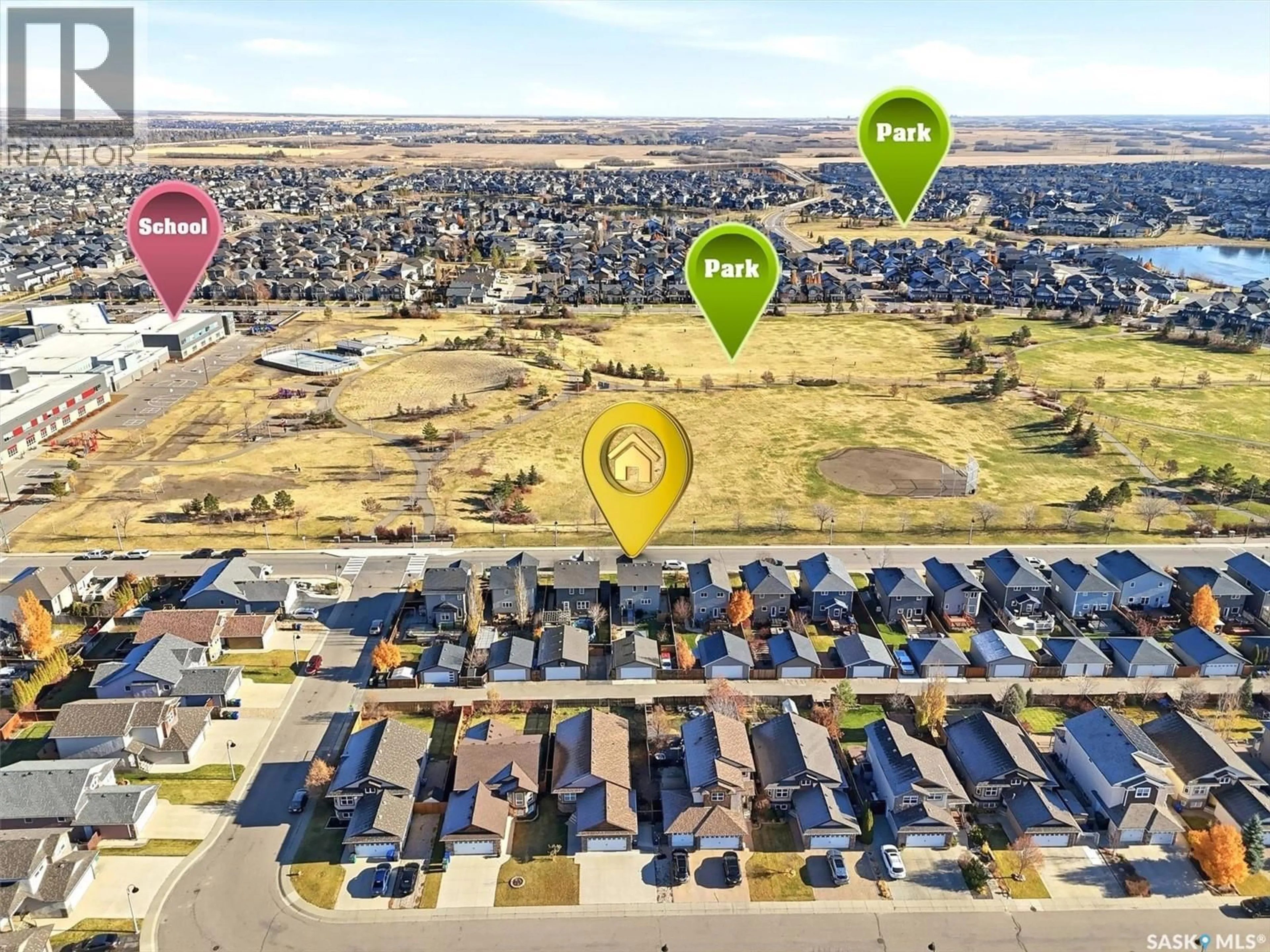 A pic from outside/outdoor area/front of a property/back of a property/a pic from drone, street for 314 STONEBRIDGE COMMON, Saskatoon Saskatchewan S7T0N6