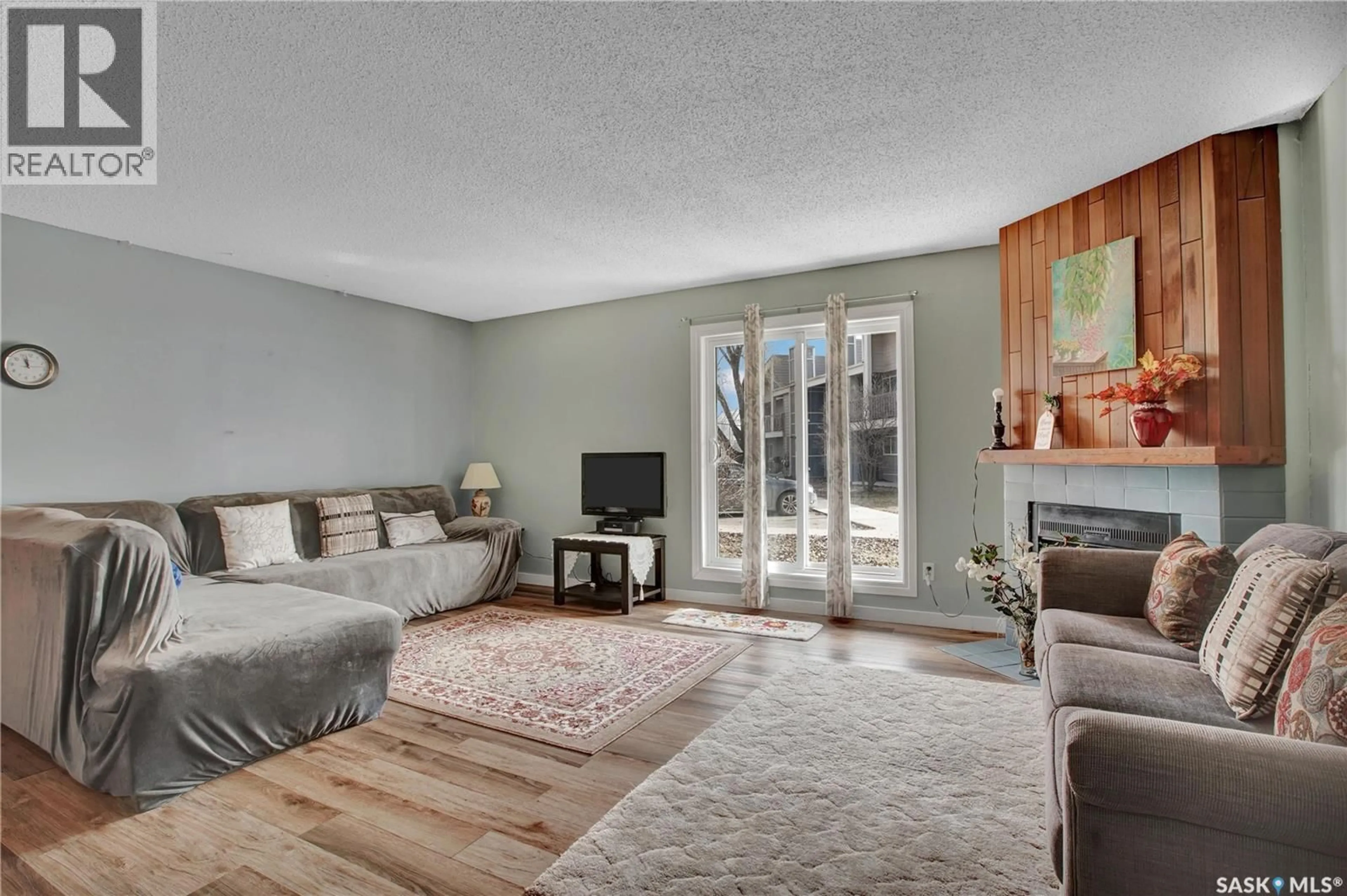 Living room with furniture, unknown for 616 425 115TH STREET, Saskatoon Saskatchewan S7N2E5