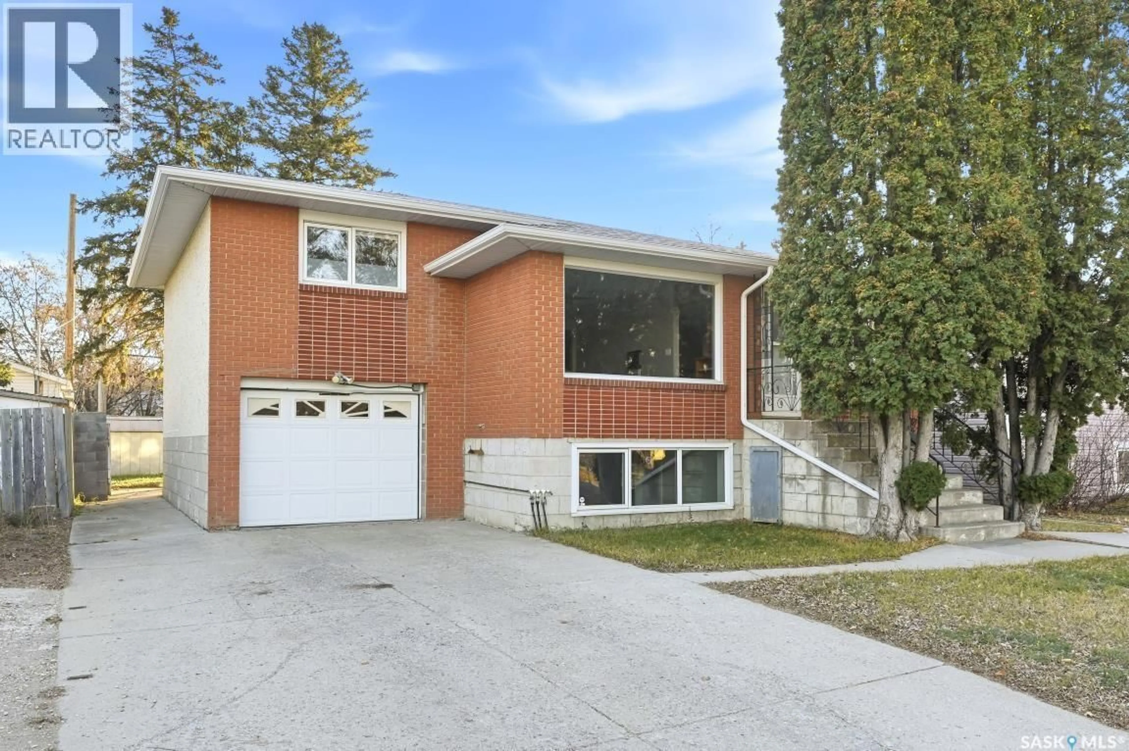 Home with brick exterior material, street for 812 L AVENUE N, Saskatoon Saskatchewan S7L2R4