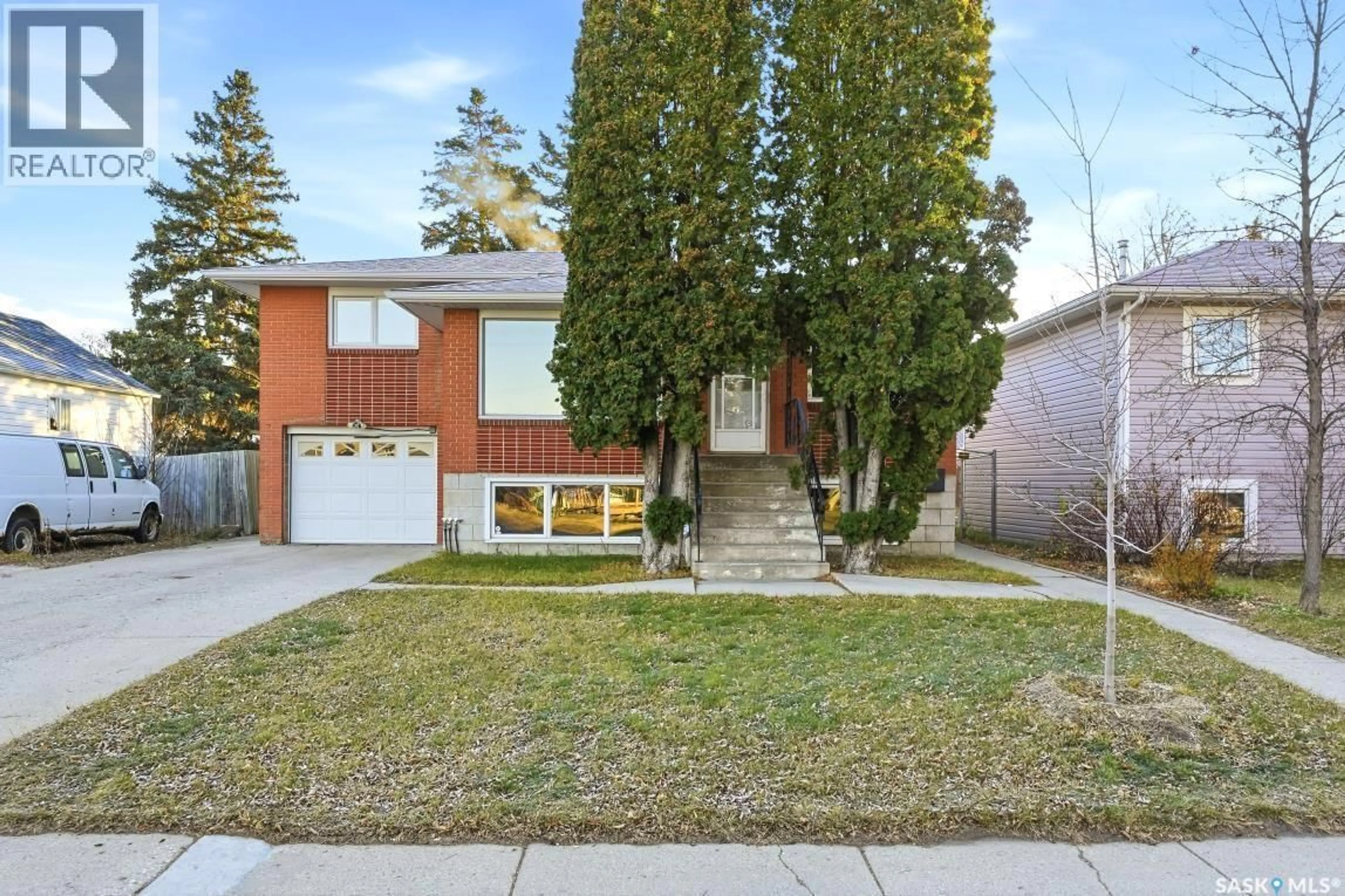 Home with brick exterior material, street for 812 L AVENUE N, Saskatoon Saskatchewan S7L2R4