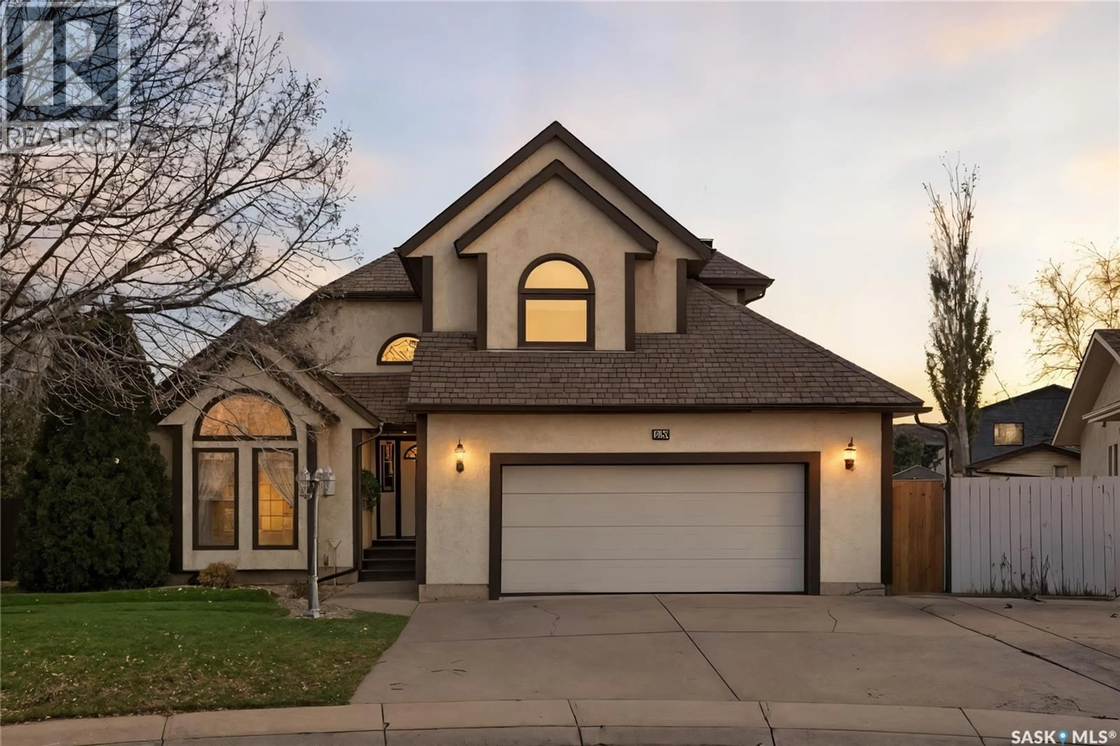 Home with brick exterior material, street for 206 HASLAM COURT, Saskatoon Saskatchewan S7S1E3