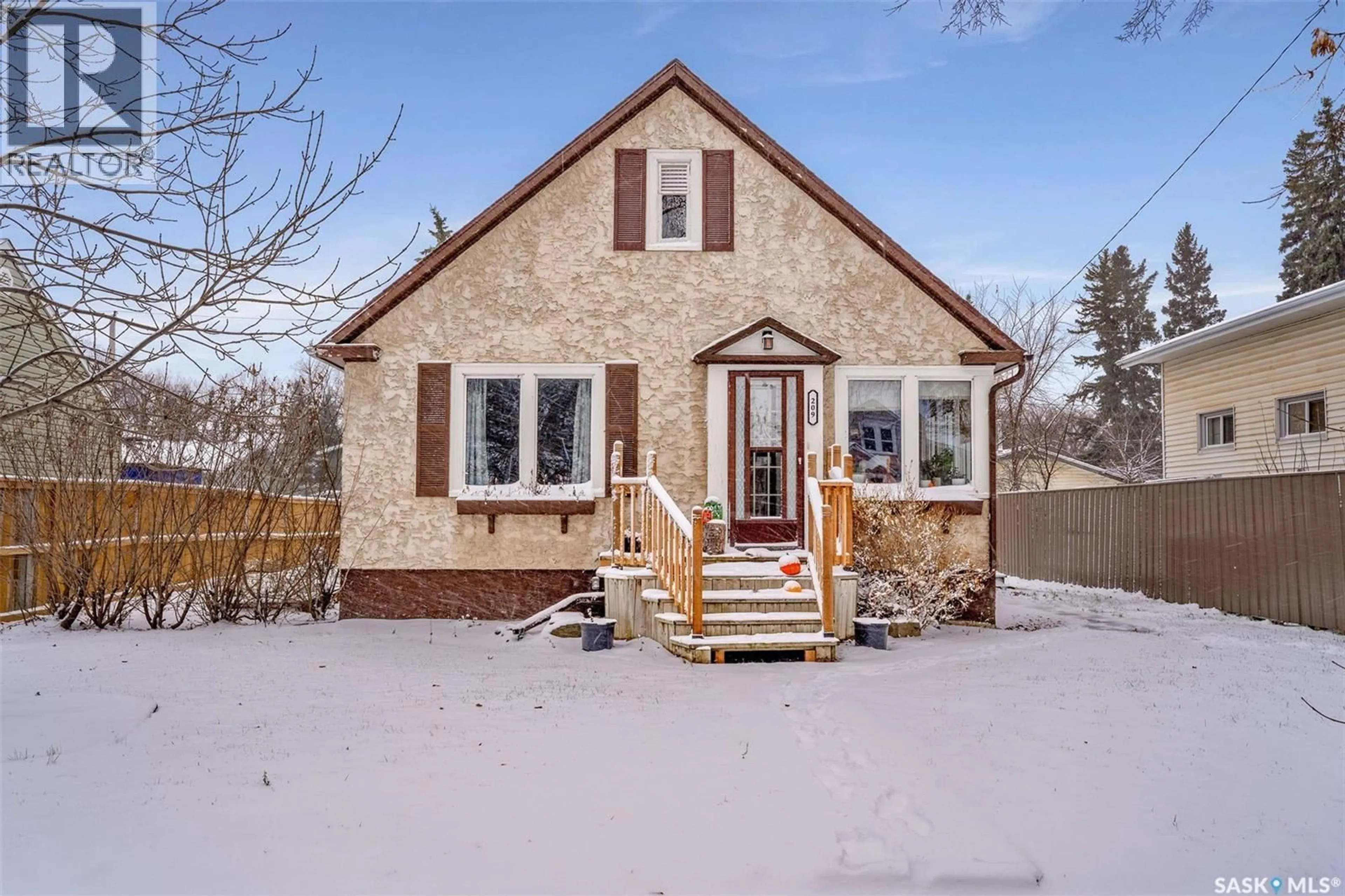 Home with brick exterior material, street for 209 STOVEL AVENUE, Melfort Saskatchewan S0E1A0