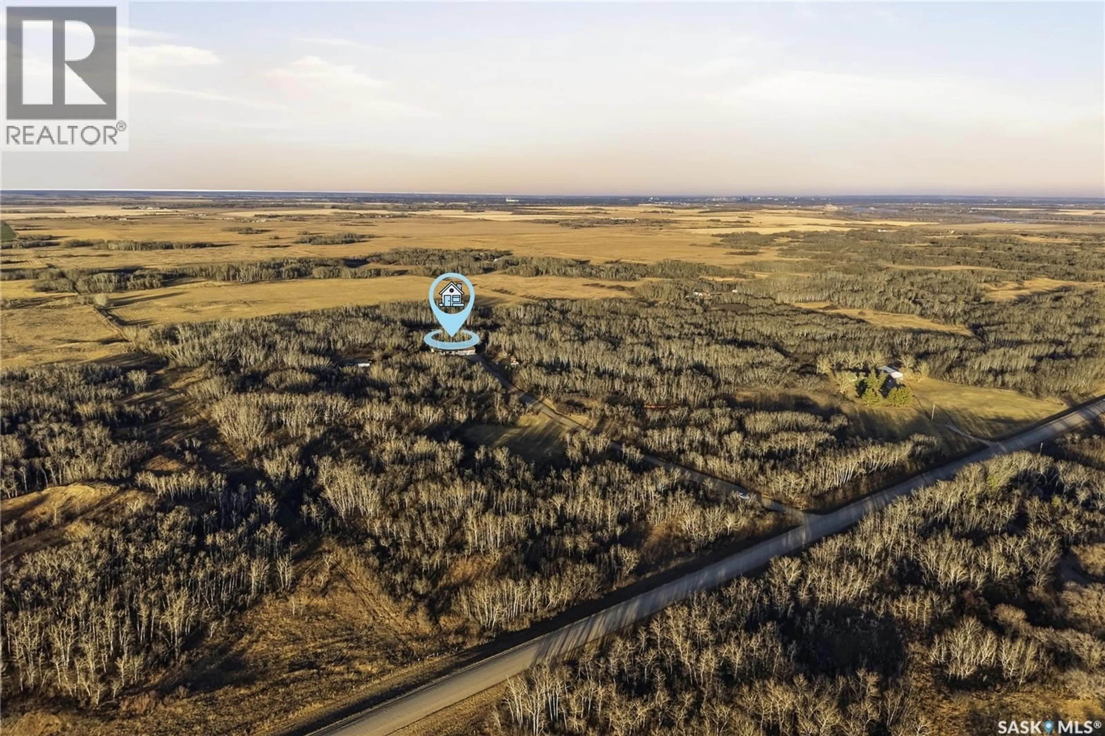A pic from outside/outdoor area/front of a property/back of a property/a pic from drone, forest/trees view for Acreage - MERRILL SCHOOL ROAD, Corman Park Rm No. 344 Saskatchewan S0K1V0