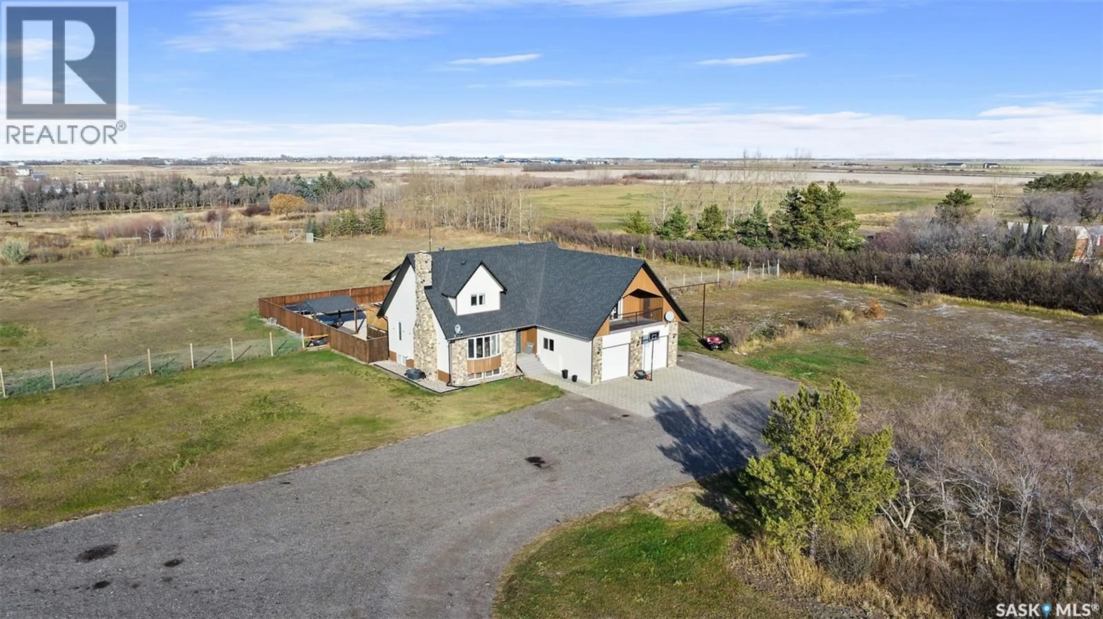 A pic from outside/outdoor area/front of a property/back of a property/a pic from drone, building for 305075 MIERAU ROAD, Corman Park Rm No. 344 Saskatchewan S0K4S0