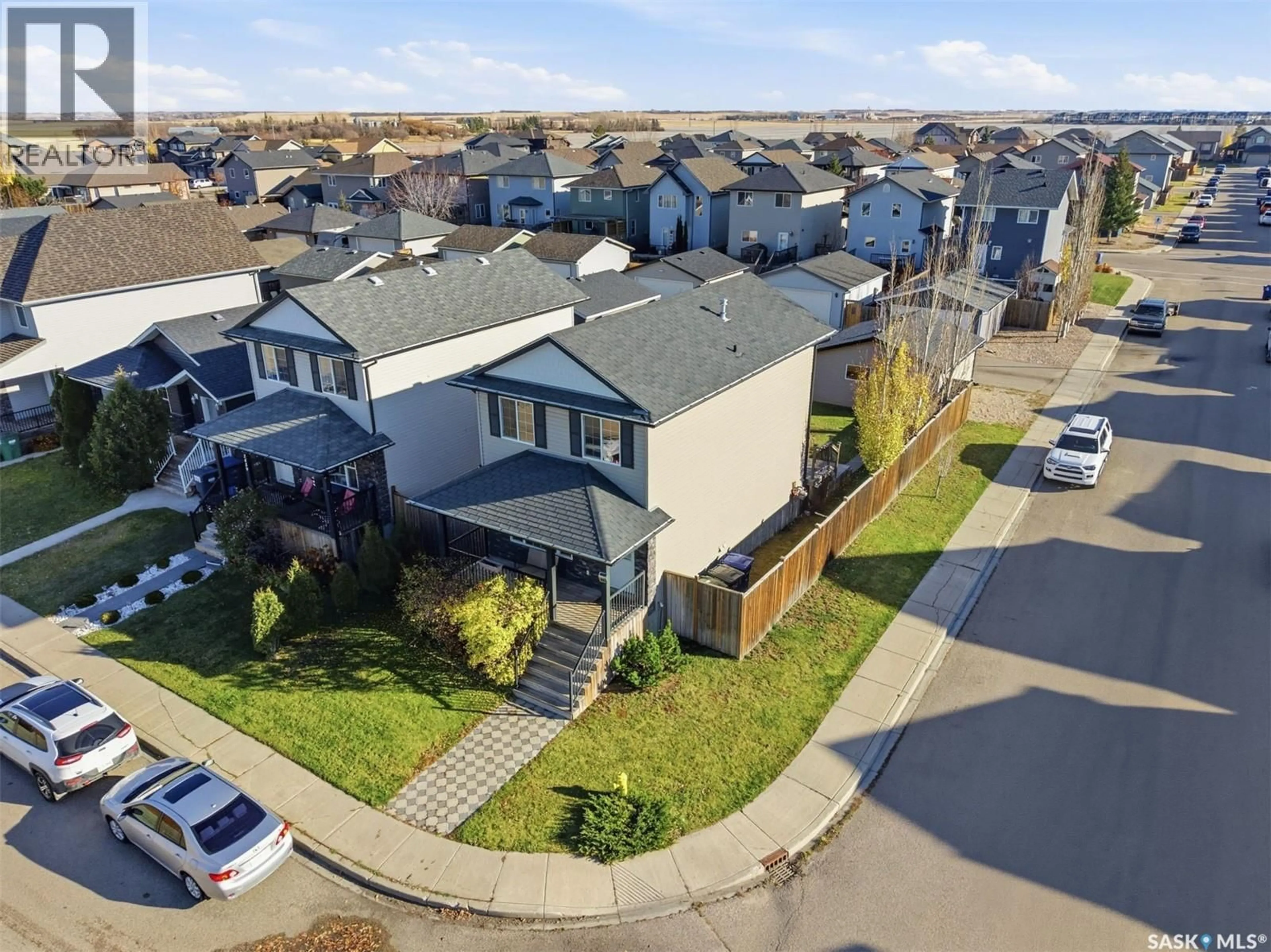 A pic from outside/outdoor area/front of a property/back of a property/a pic from drone, street for 1463 WILLOWGROVE COURT, Saskatoon Saskatchewan S7W0B1