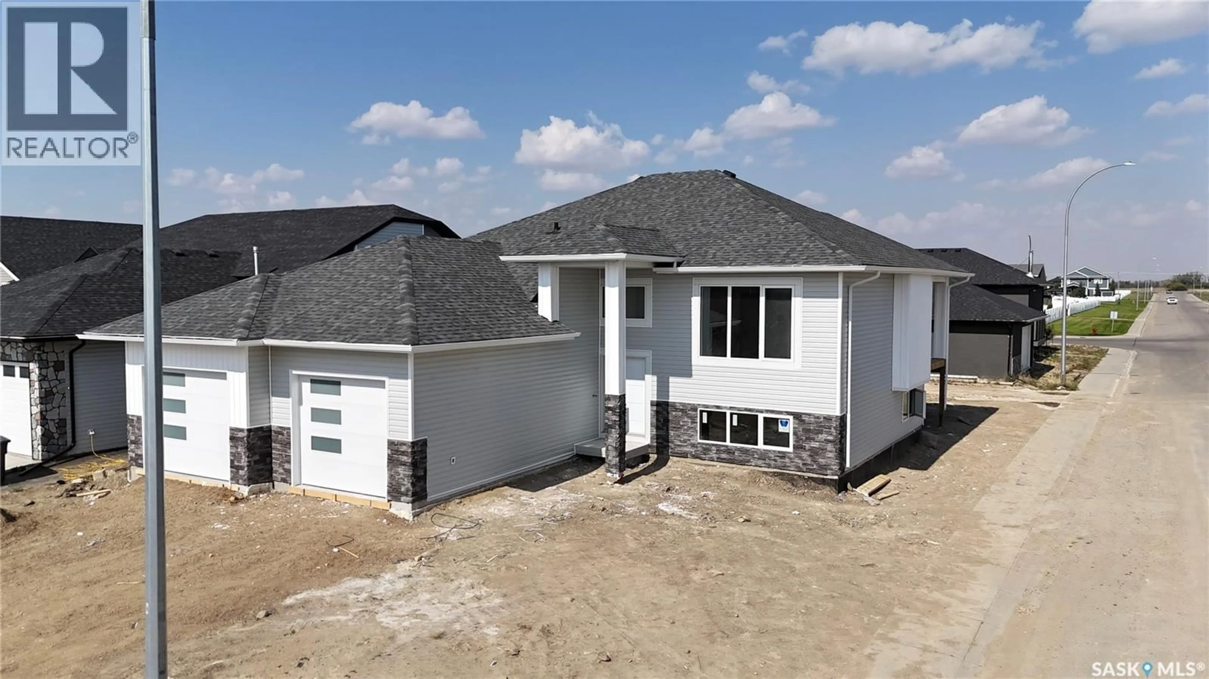 Home with vinyl exterior material, building for 501 JONES CRESCENT, Warman Saskatchewan S0K4S4