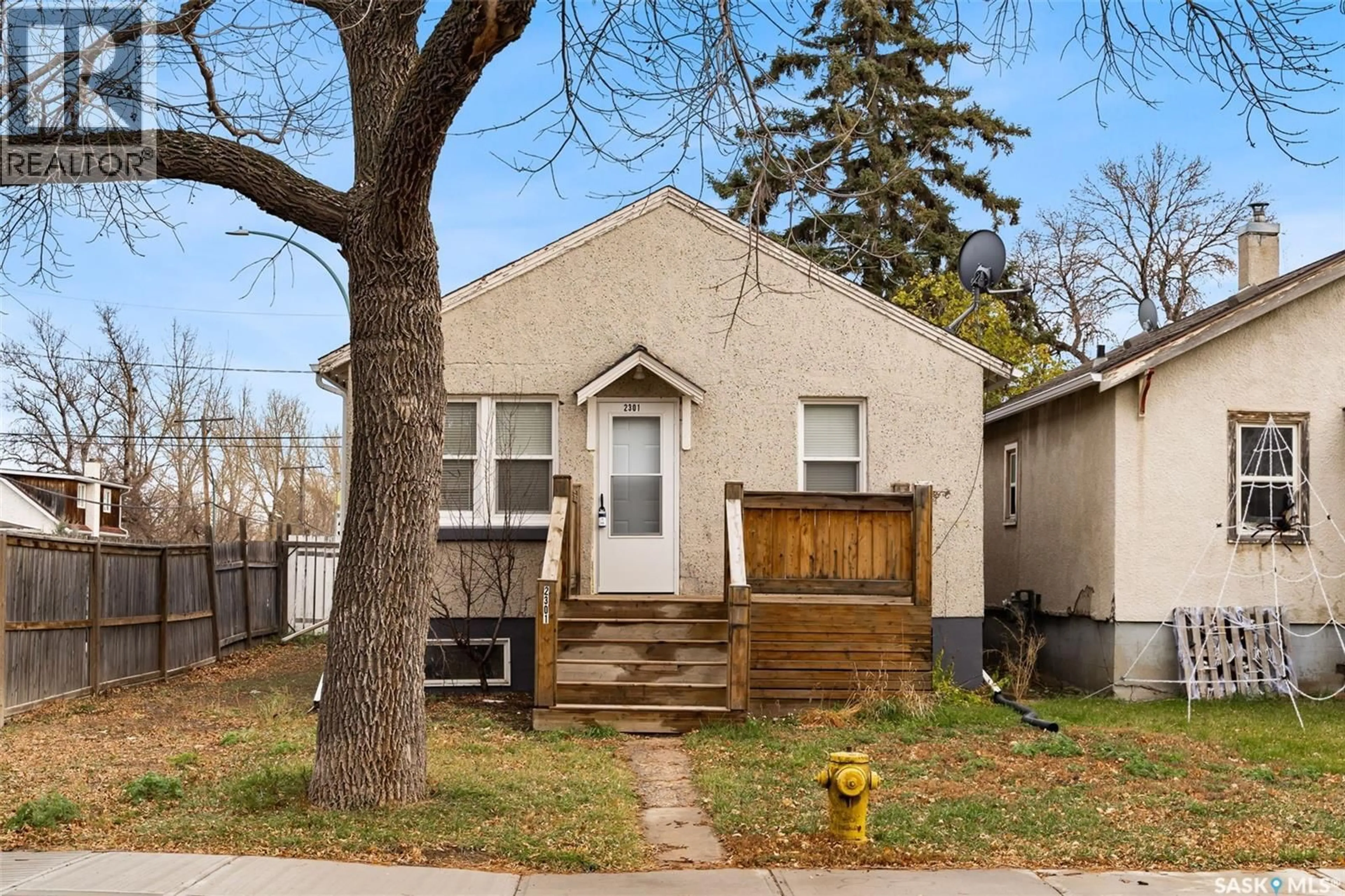Home with brick exterior material, street for 2301 REYNOLDS STREET, Regina Saskatchewan S4N3N6