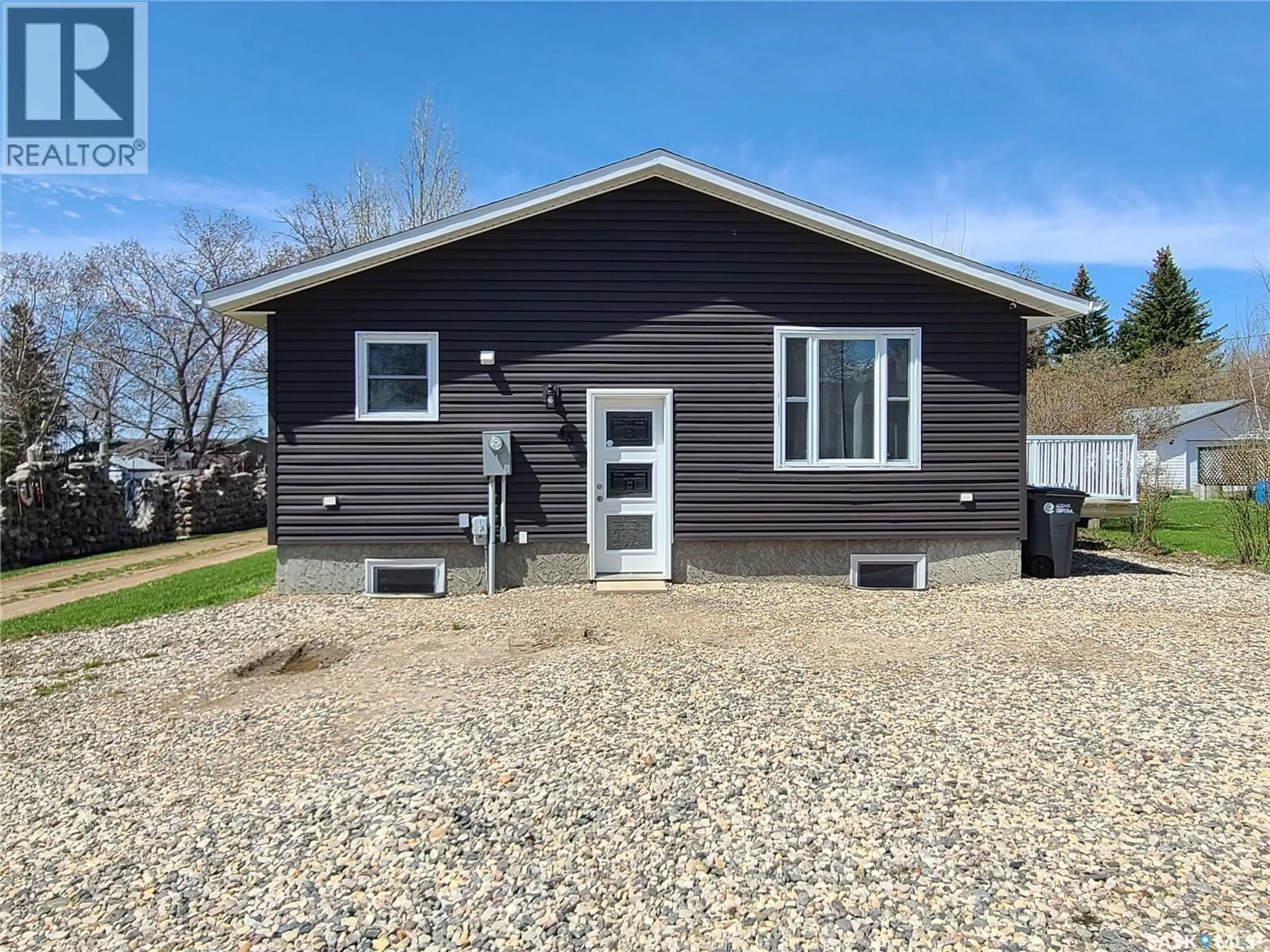 Home with vinyl exterior material, street for 46 NEWCOMBE STREET, Manor Saskatchewan S0C1R0