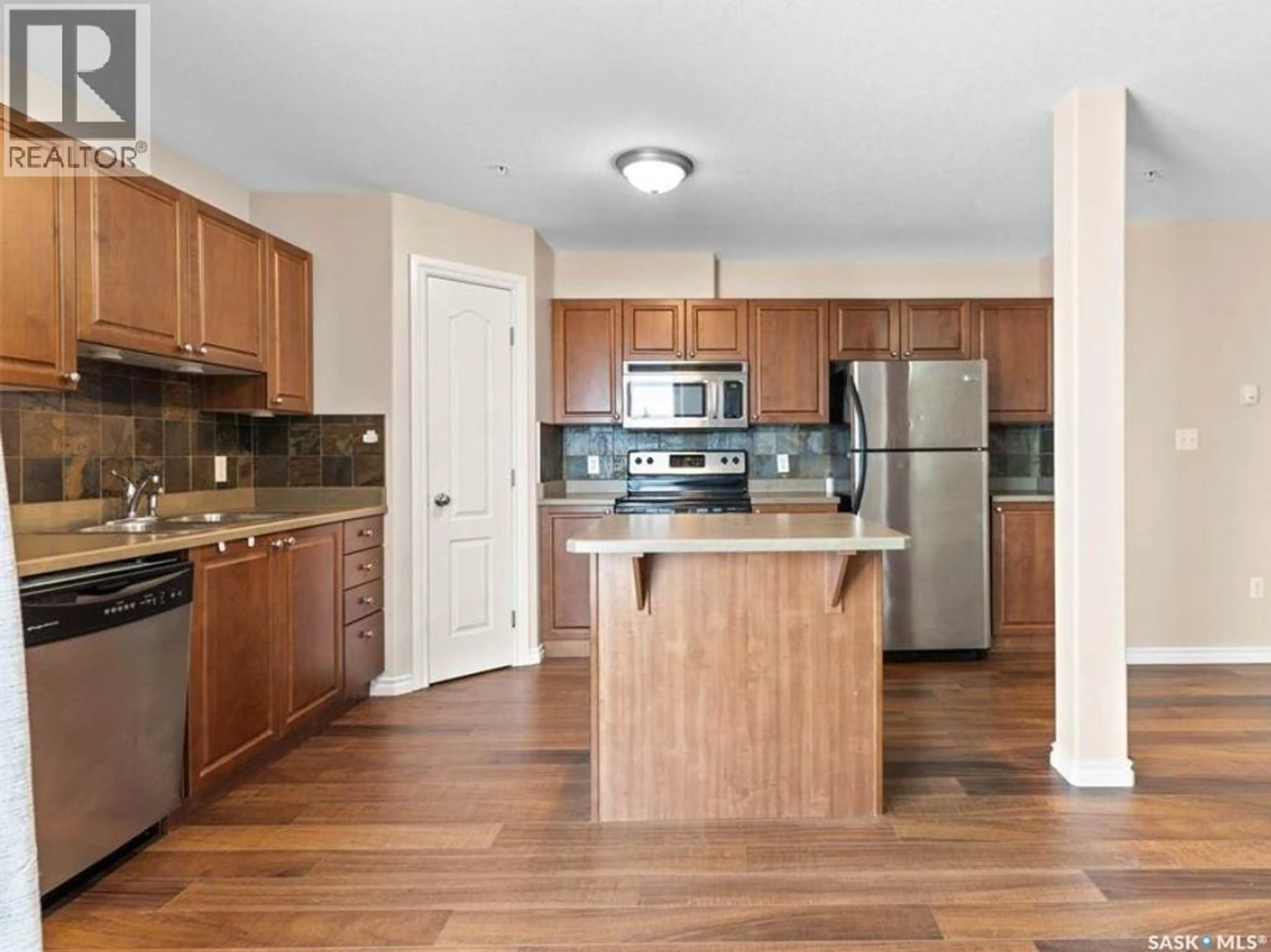 Standard kitchen, wood/laminate floor for N - 202 100 1ST AVENUE, Warman Saskatchewan S0K0A1