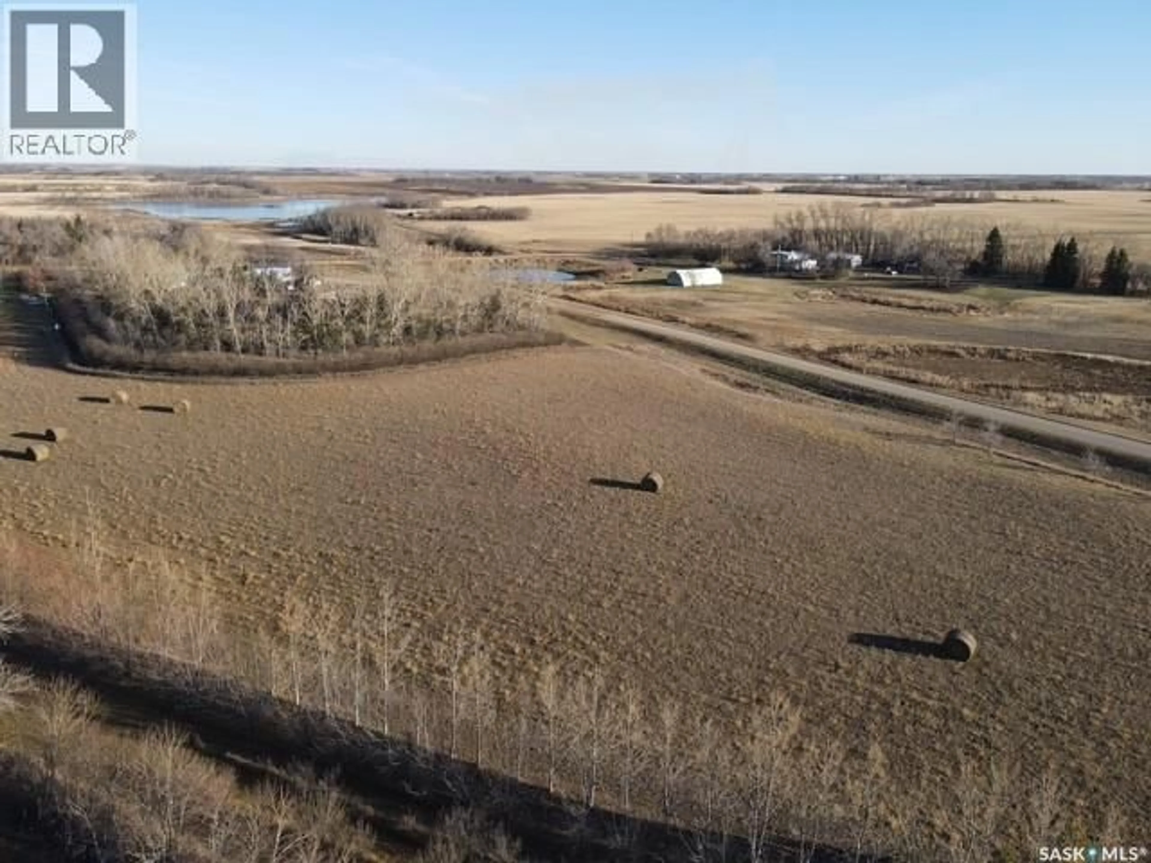 A pic from outside/outdoor area/front of a property/back of a property/a pic from drone, water/lake/river/ocean view for ALLIN ACREAGE, Orkney Rm No. 244 Saskatchewan S3N2V6