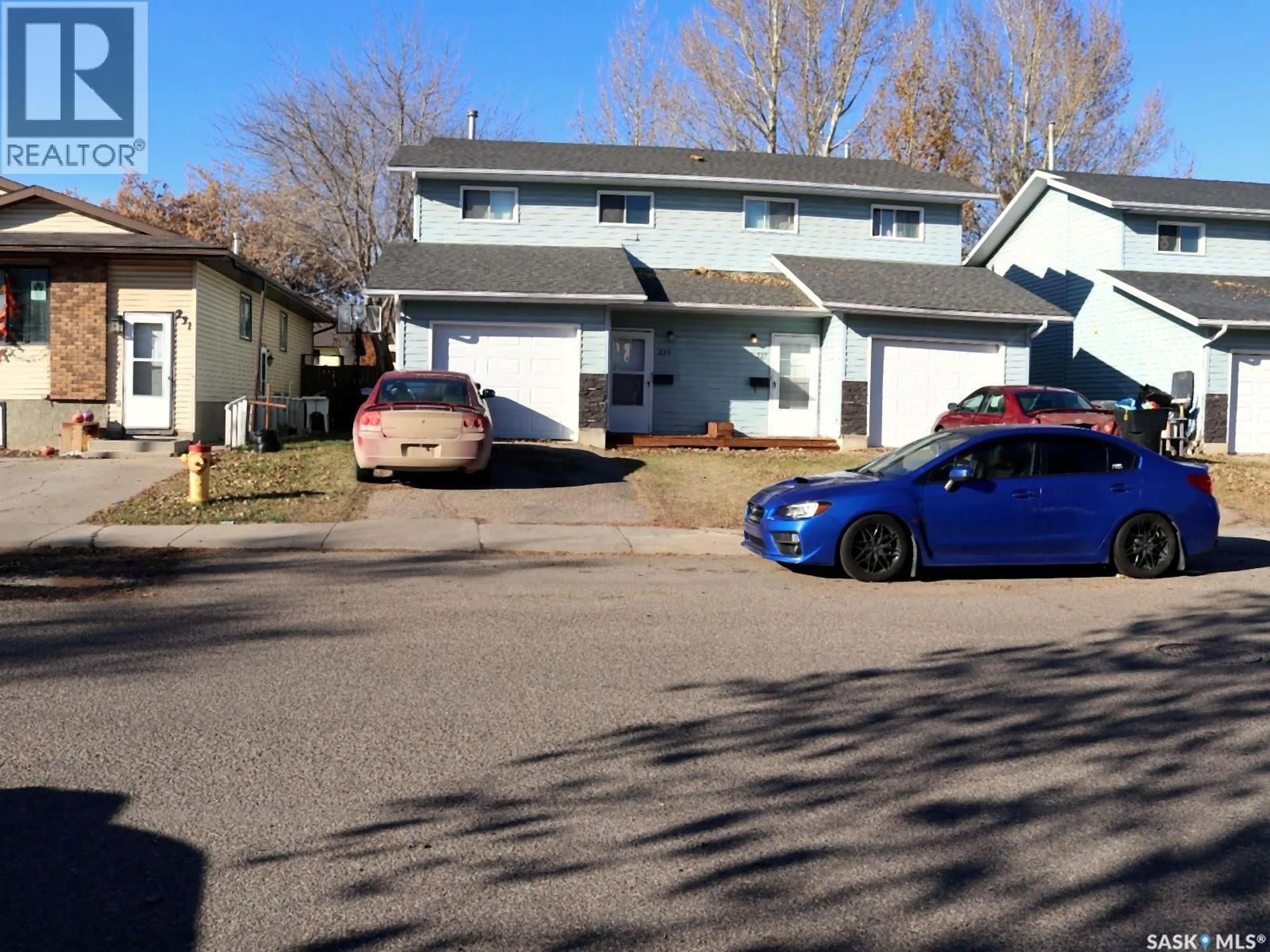 A pic from outside/outdoor area/front of a property/back of a property/a pic from drone, street for 227-229 WAKABAYASHI WAY, Saskatoon Saskatchewan S7K7M4