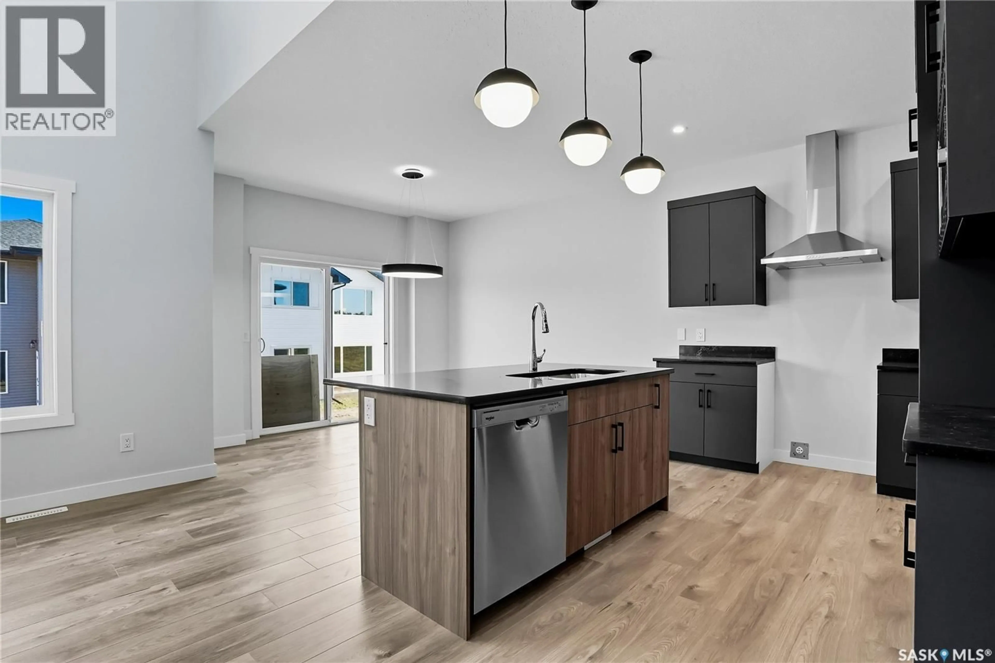 Open concept kitchen, unknown for 907 TRAEGER MANOR, Saskatoon Saskatchewan S7V1V8