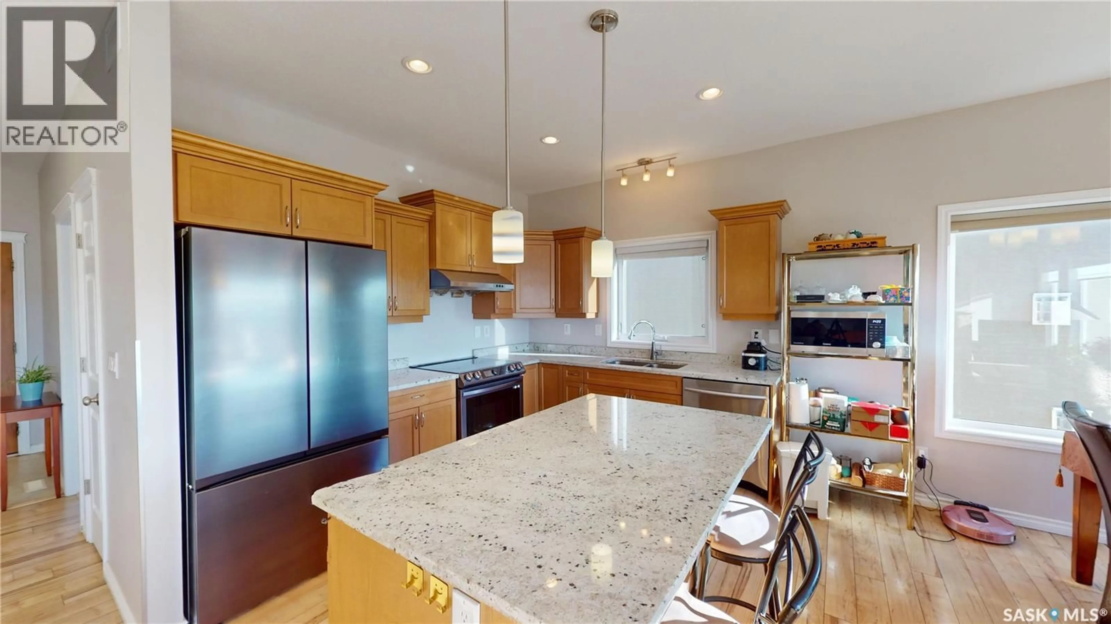 Open concept kitchen, ceramic/tile floor for 242 WHALLEY CRESCENT, Saskatoon Saskatchewan S7T0N9