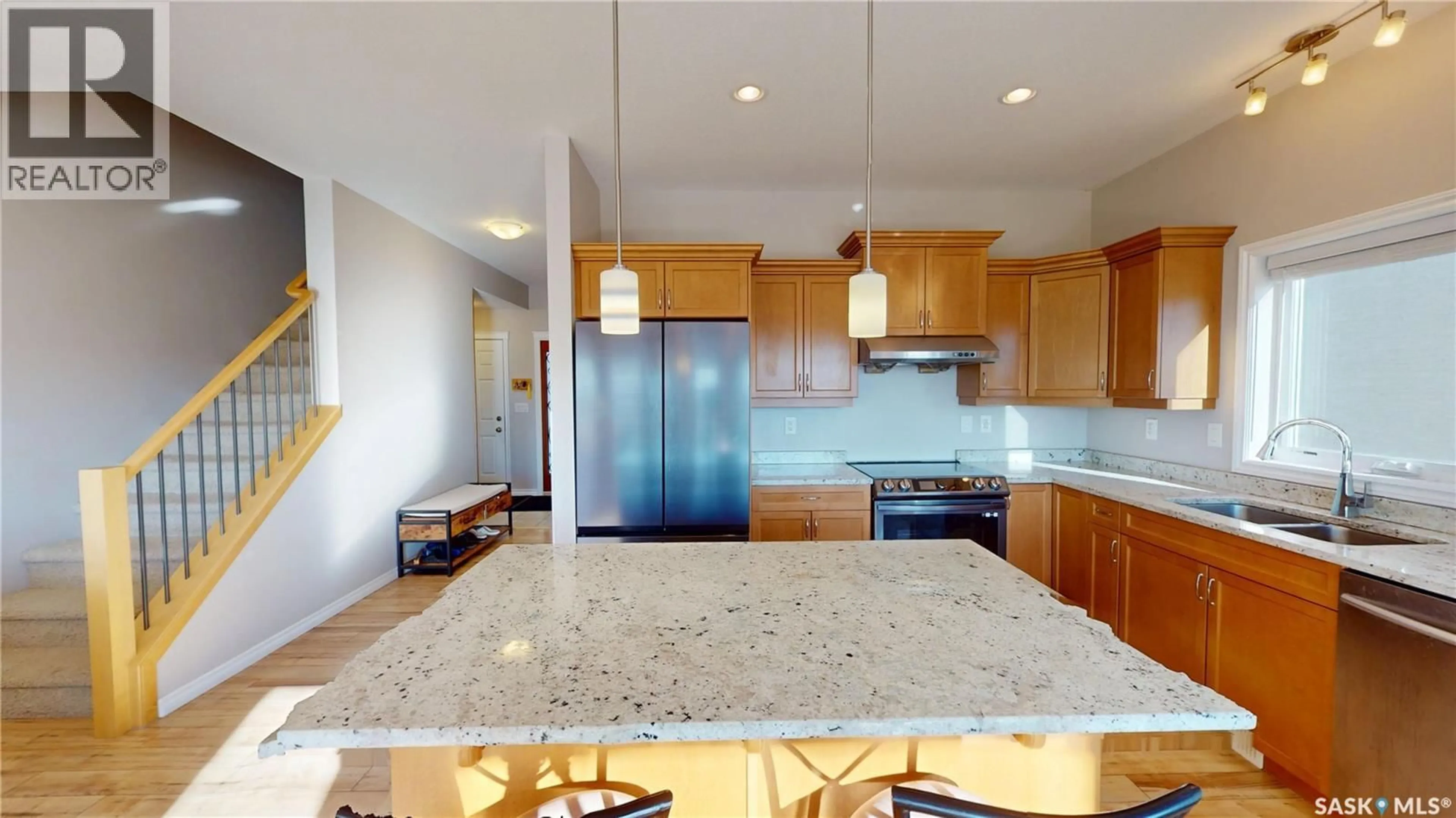 Open concept kitchen, ceramic/tile floor for 242 WHALLEY CRESCENT, Saskatoon Saskatchewan S7T0N9