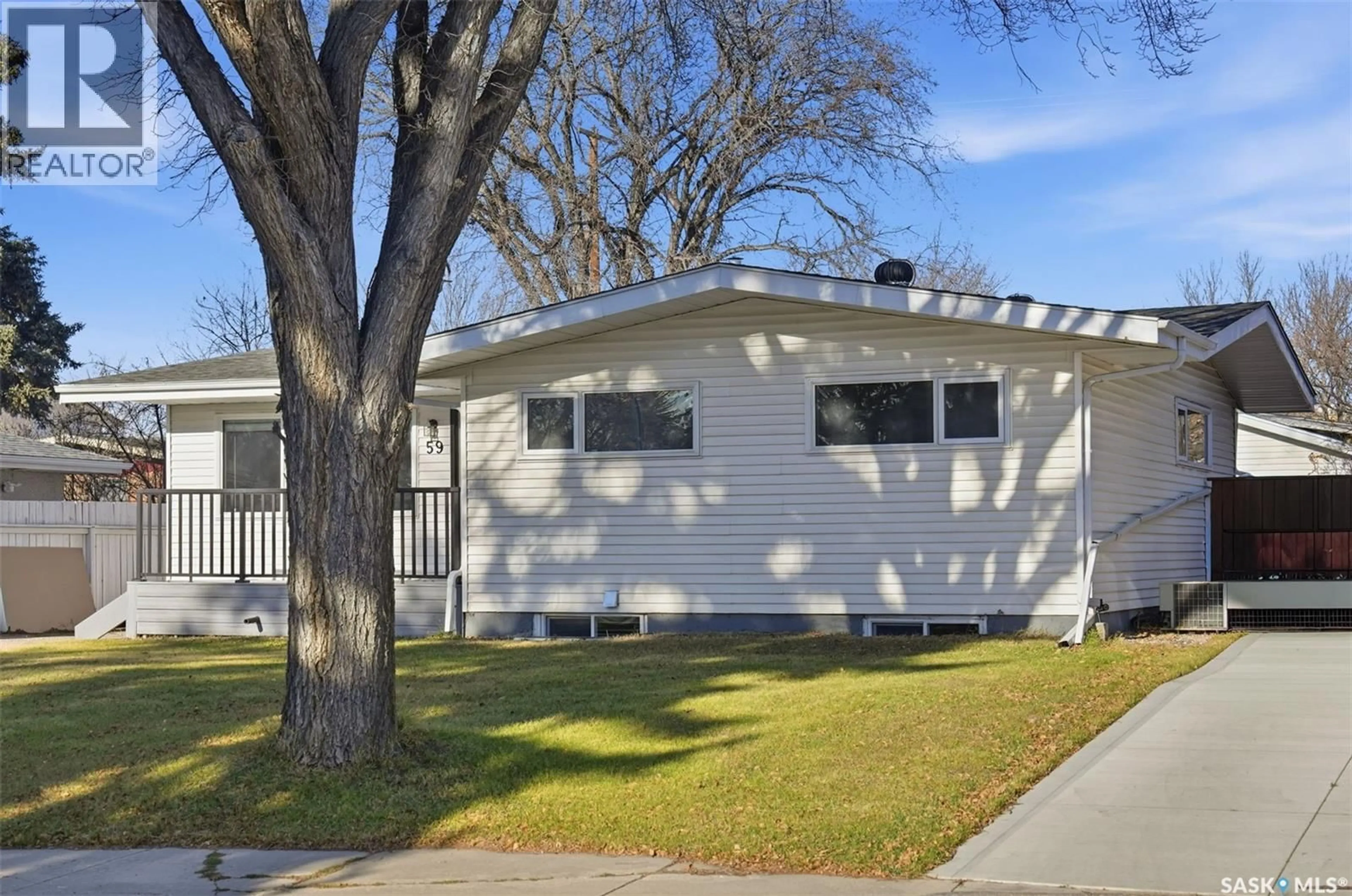 Home with vinyl exterior material, street for 59 TUCKER CRESCENT, Saskatoon Saskatchewan S7H3H4