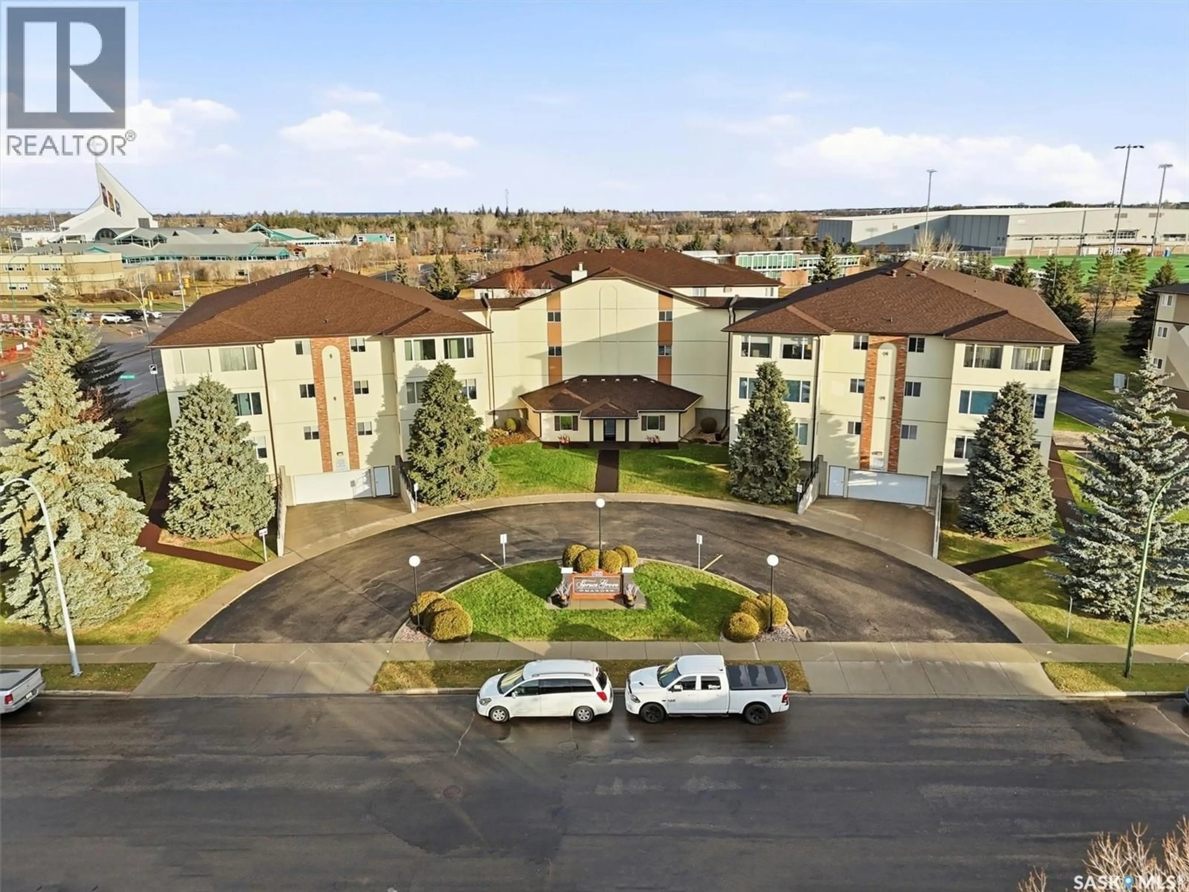 A pic from outside/outdoor area/front of a property/back of a property/a pic from drone, building for 201 103 KEEVIL CRESCENT, Saskatoon Saskatchewan S7N4L9